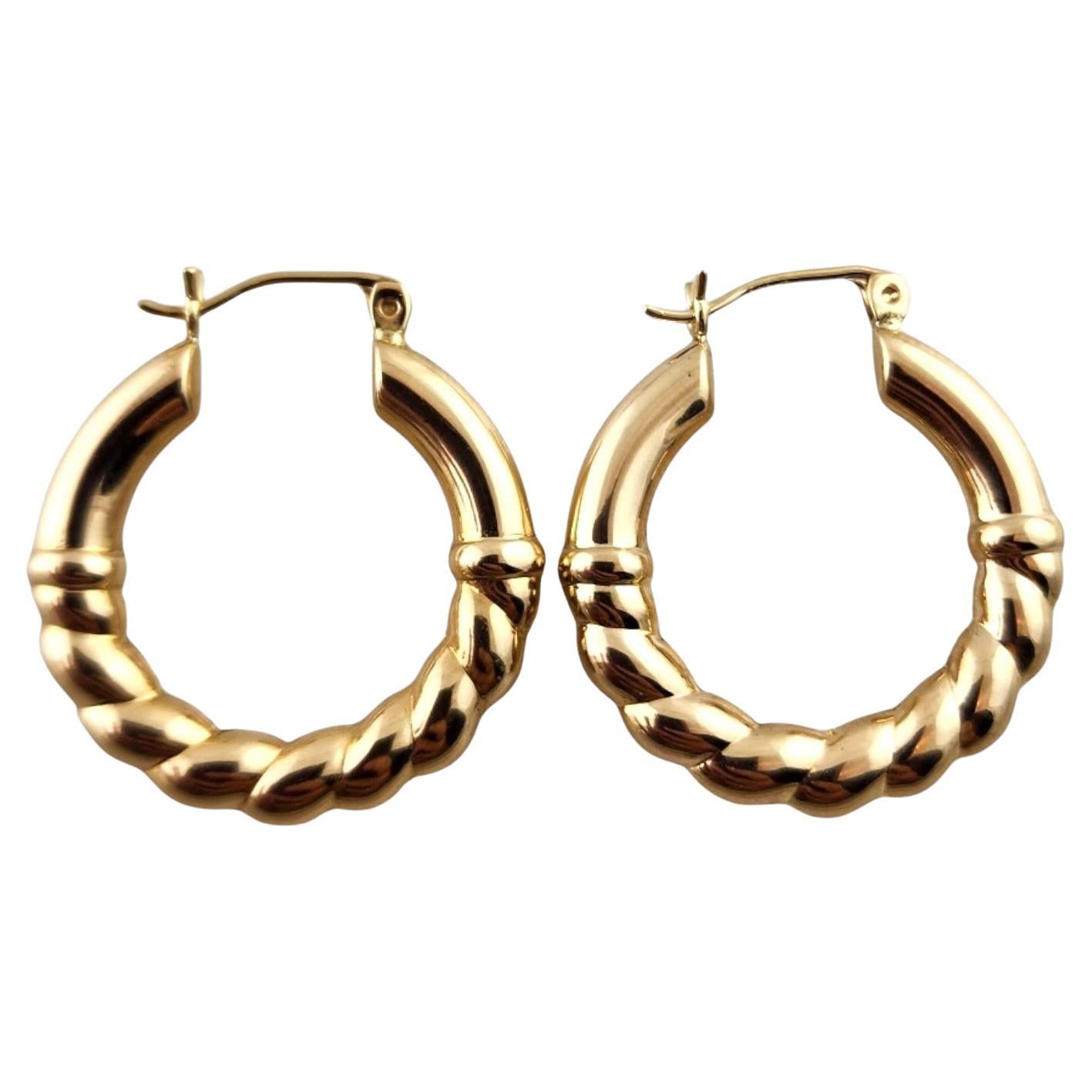 14 Karat Yellow Gold Twisted Gold Hoop Earrings #19137