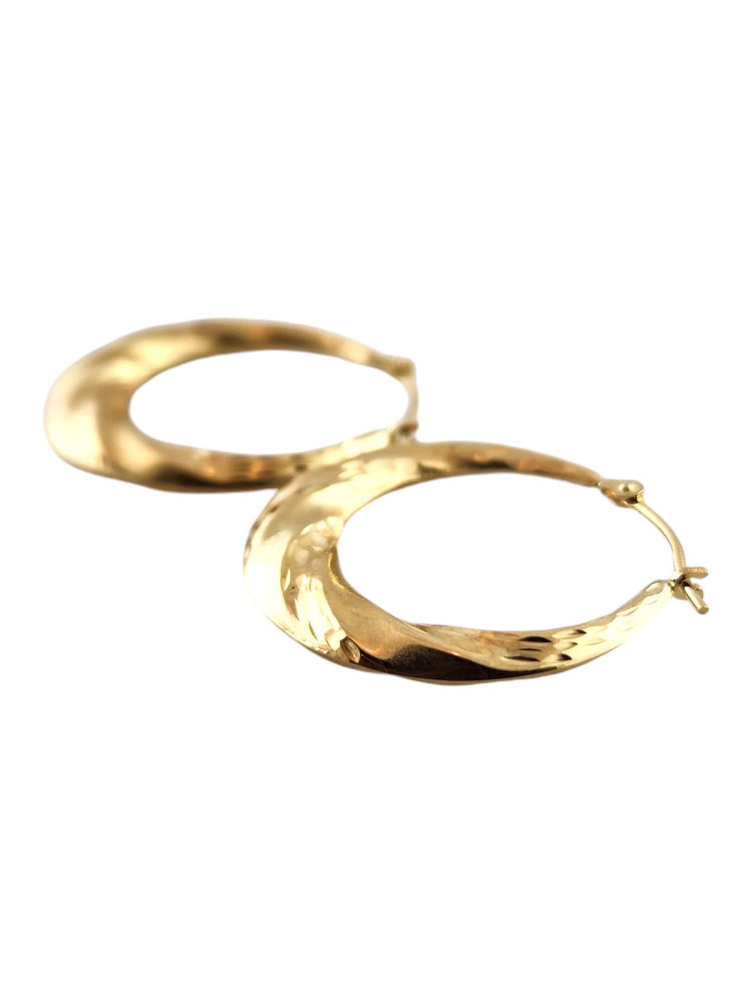 Women's 14 Karat Yellow Gold Twisted Hoop Earrings #19138 For Sale
