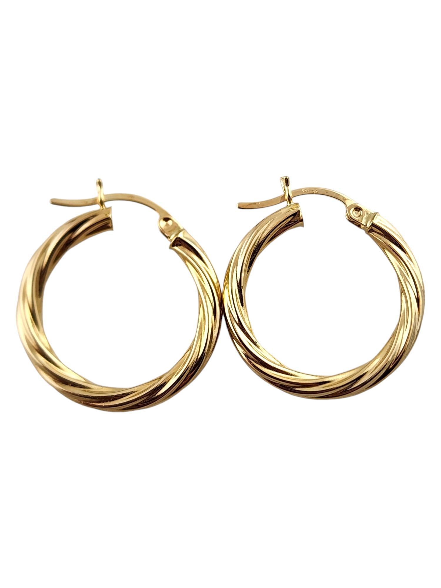 14 Karat Yellow Gold Twisted Hoop Earrings #19144 For Sale 1