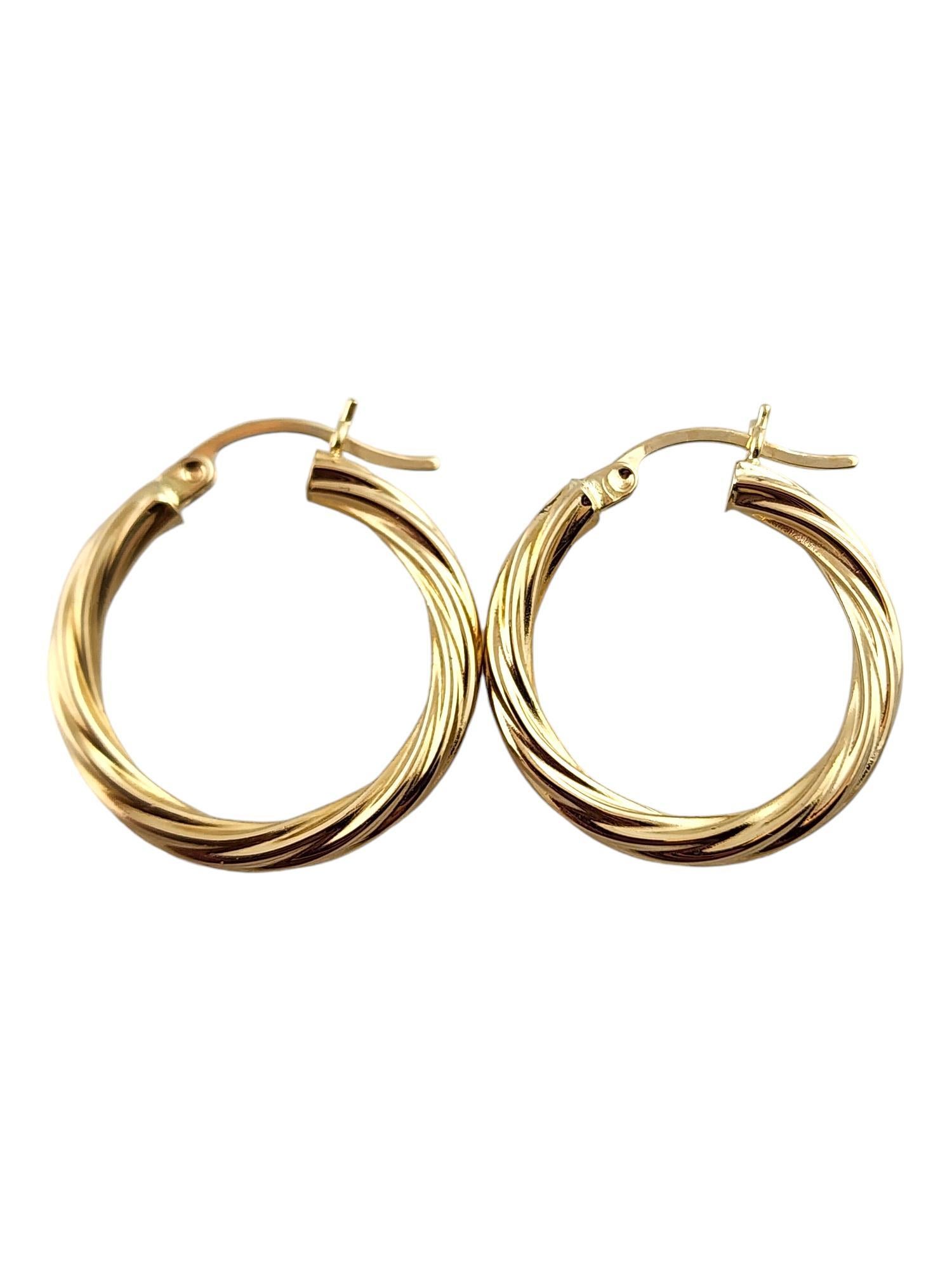 14 Karat Yellow Gold Twisted Hoop Earrings #19144