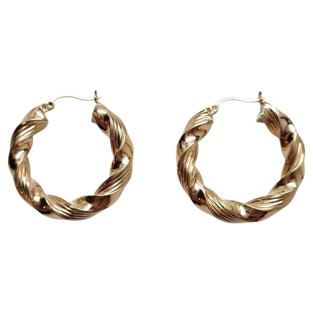 14 Karat Yellow Gold Twisted Hoop Earrings #21934