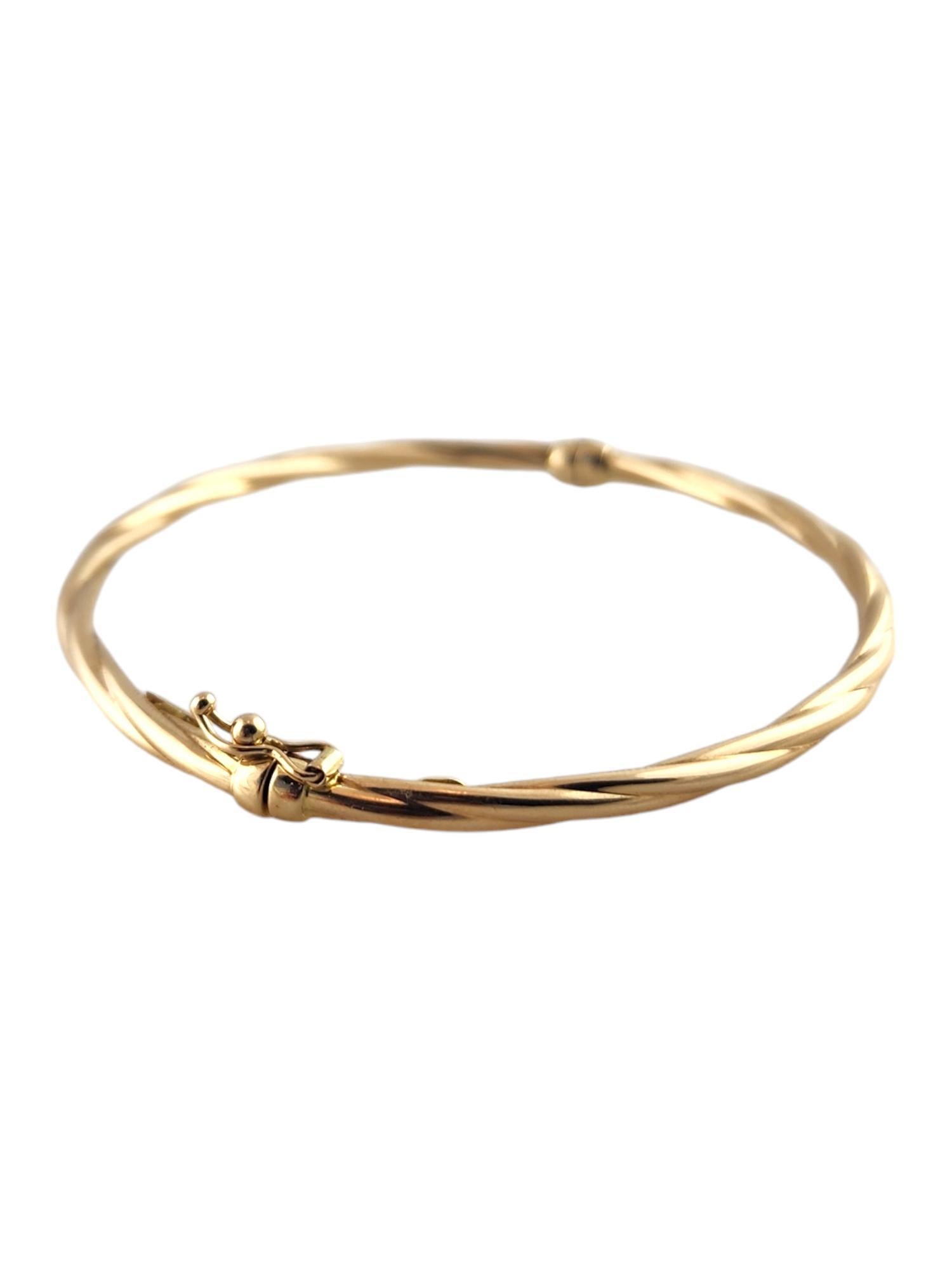 14 Karat Yellow Gold Twisted Oval Bangle Bracelet #19007 In Good Condition In Washington Depot, CT