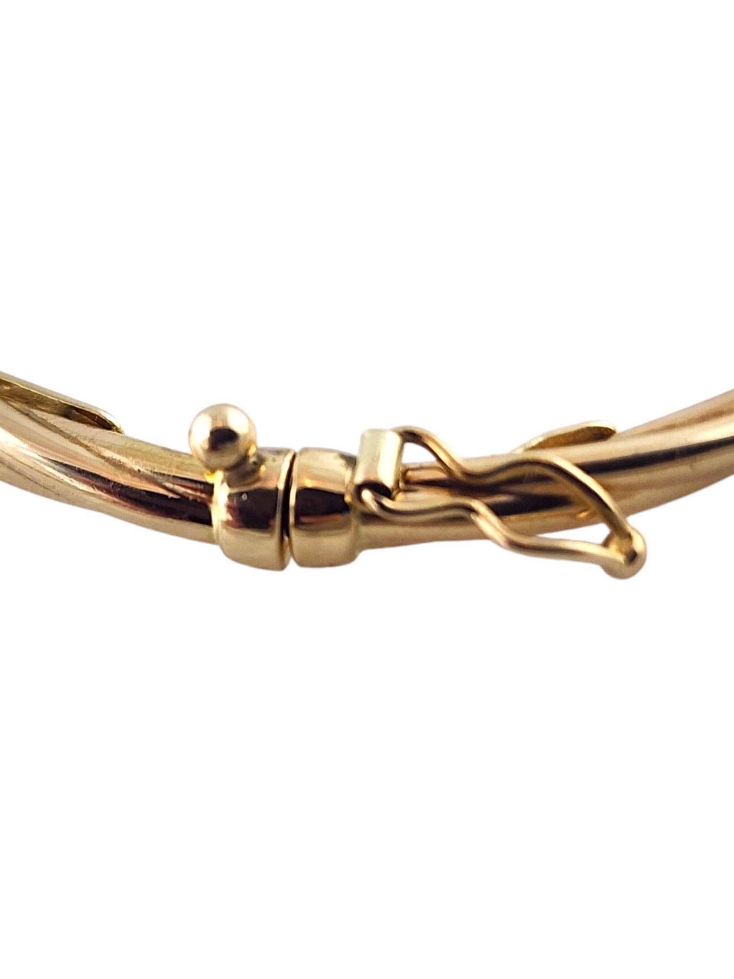 14 Karat Yellow Gold Twisted Oval Bangle Bracelet #19007 1
