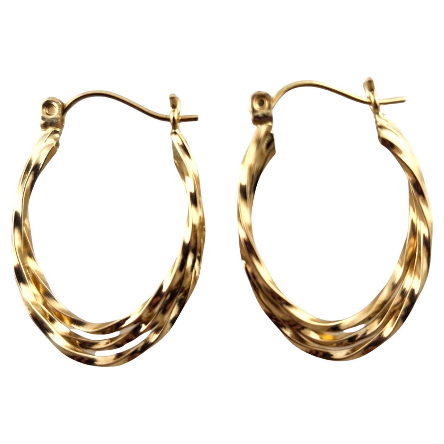14 Karat Yellow Gold Twisted Triple Oval Hoop Earrings #18920