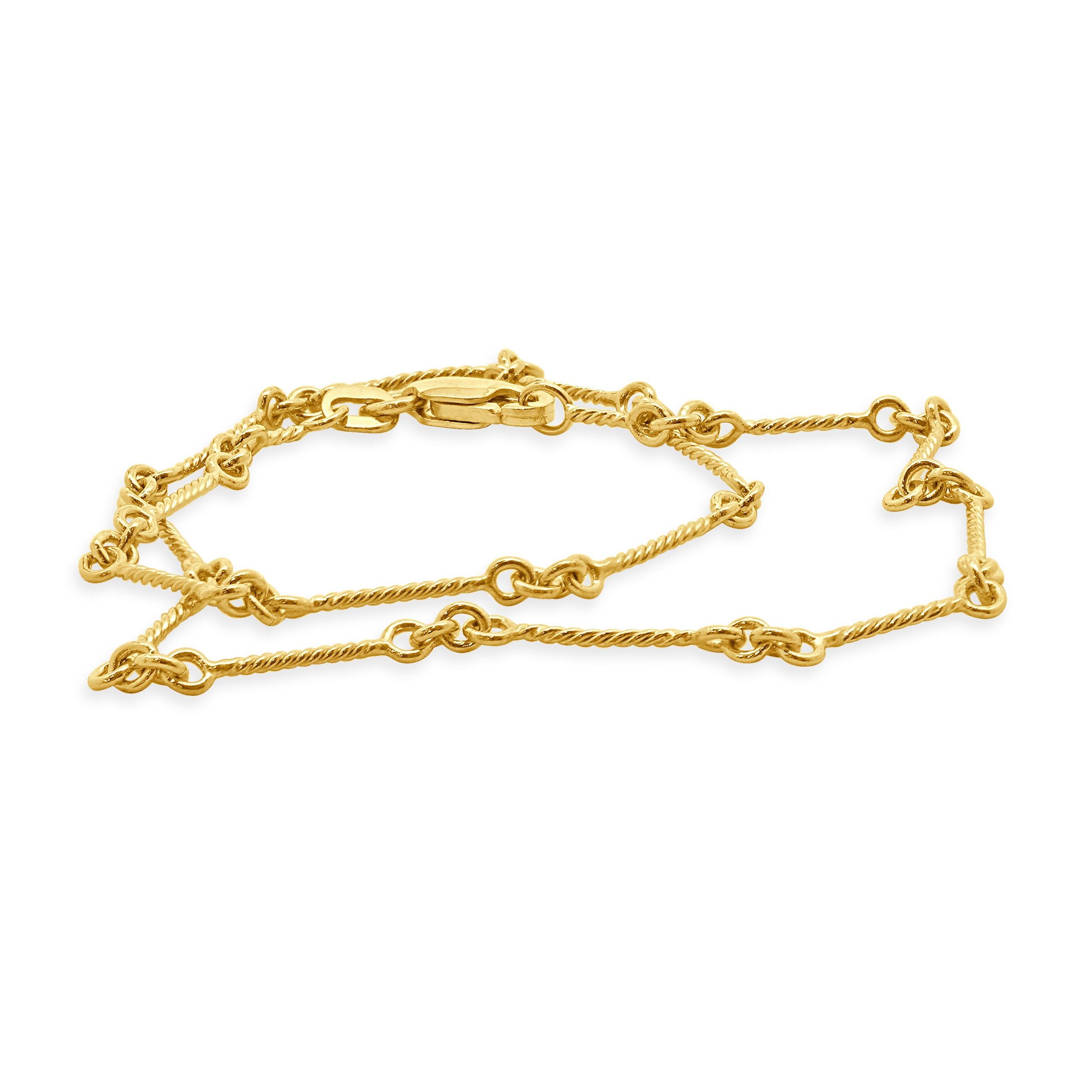 Material: 14K yellow gold
Dimensions: bracelet will fit up to a 10 1/8-inch wrist
Weight: 2.65 grams
