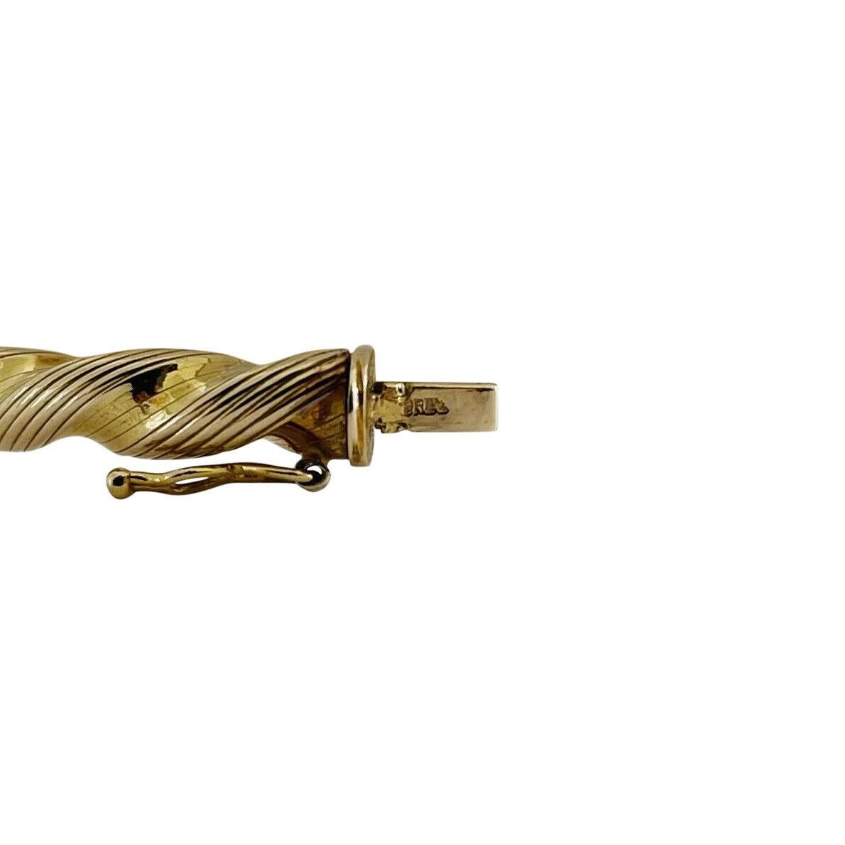 14 Karat Yellow Gold UnoAErre Ribbed Twisted Bangle Bracelet, Italy 1