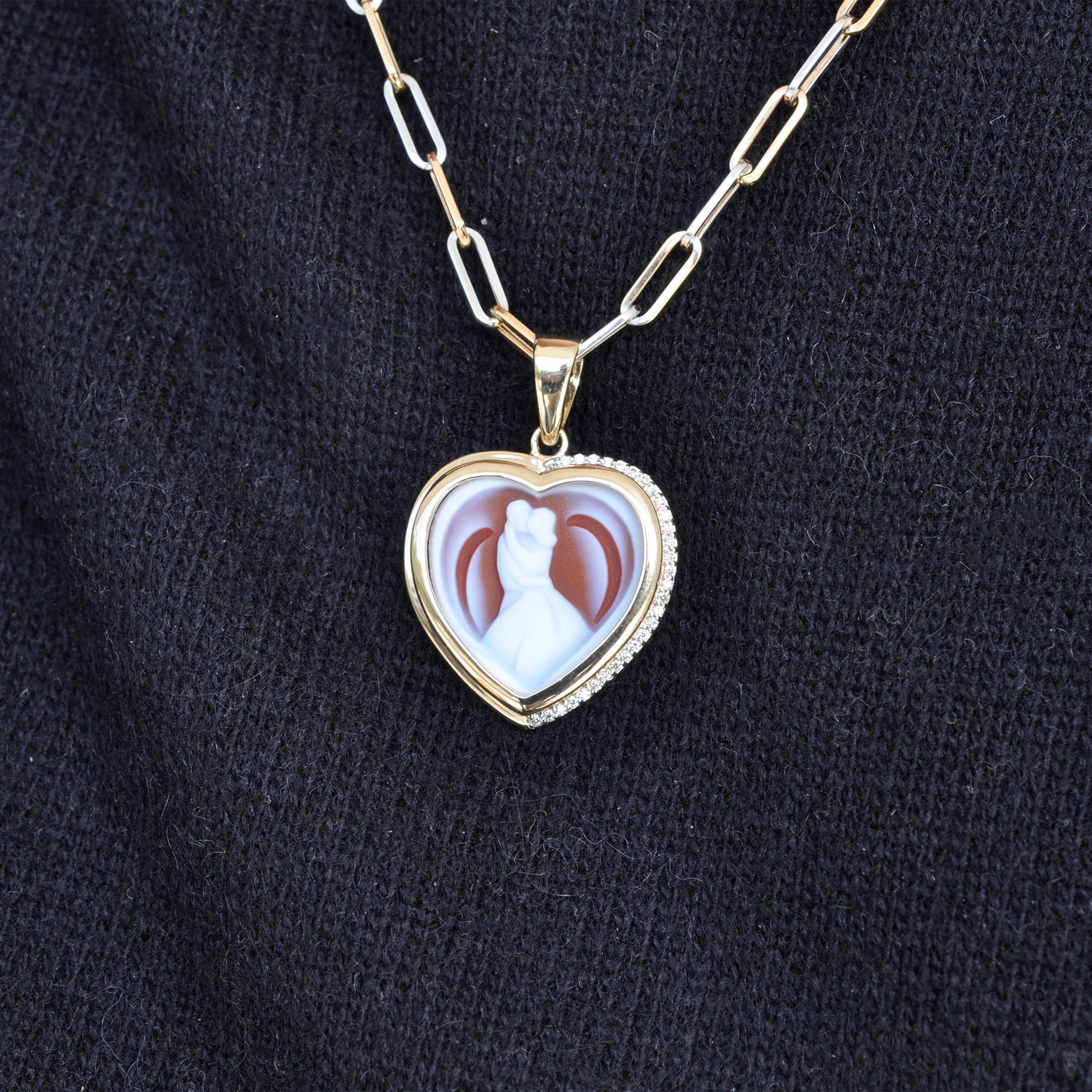 14 karat yellow gold valentine couple agate cameo carving diamond pendant necklace

Introducing the stunning Couple Cameo Pendant Necklace, a true masterpiece crafted with exquisite detail. This pendant is expertly fashioned from lustrous 14 karat