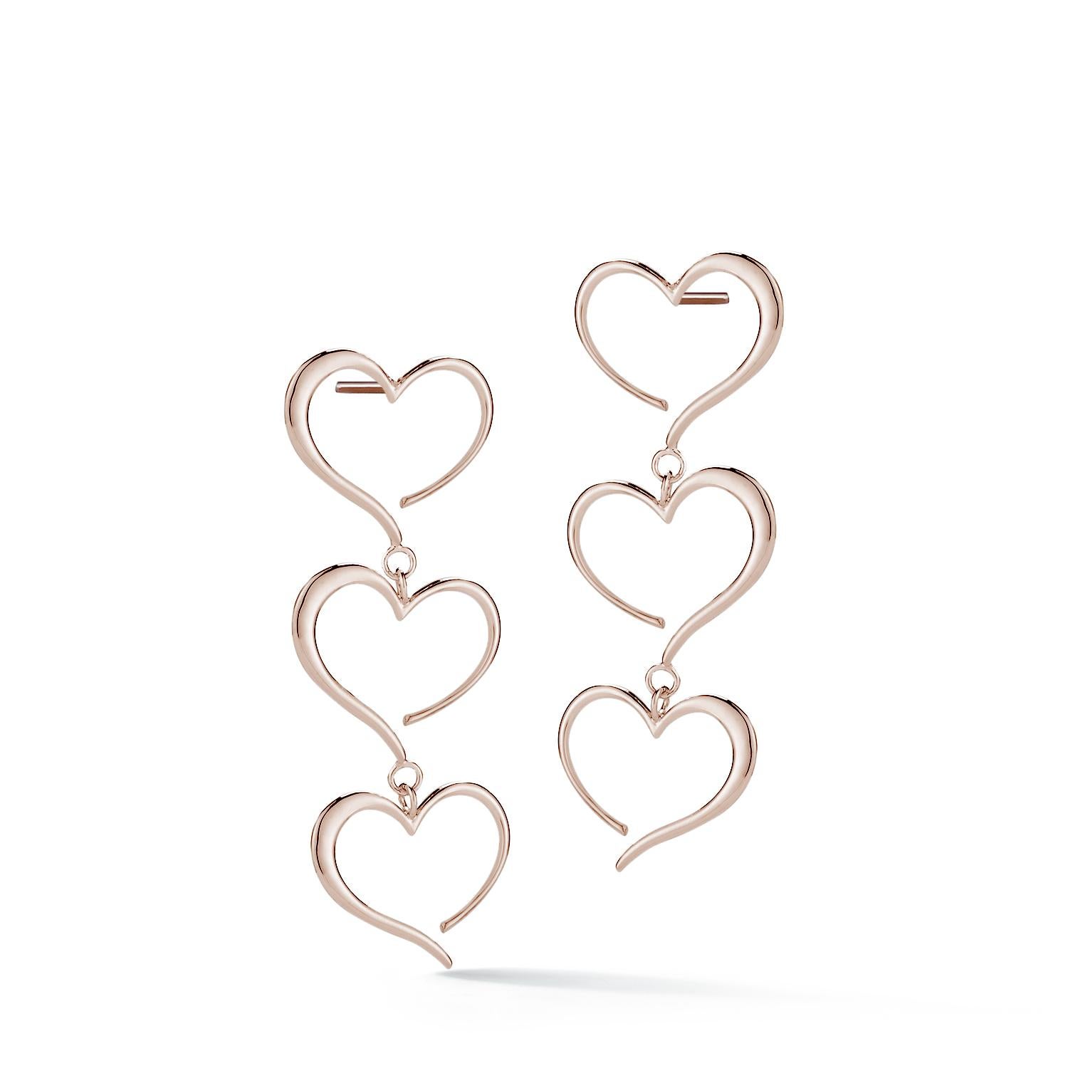 Designed in NYC

24k Yellow Gold Vermeil Triple Heart Dangle Earrings. On the road to charting your own path, the only rule is to follow your heart. Triple heart dangle earrings:

Sterling silver in 24k yellow gold vermeil 
High-polish