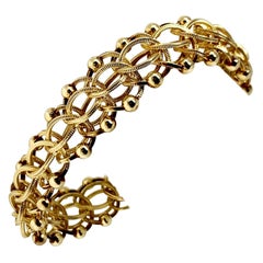 14 Karat Yellow Gold Vintage Bead Spiral Link Charm Bracelet