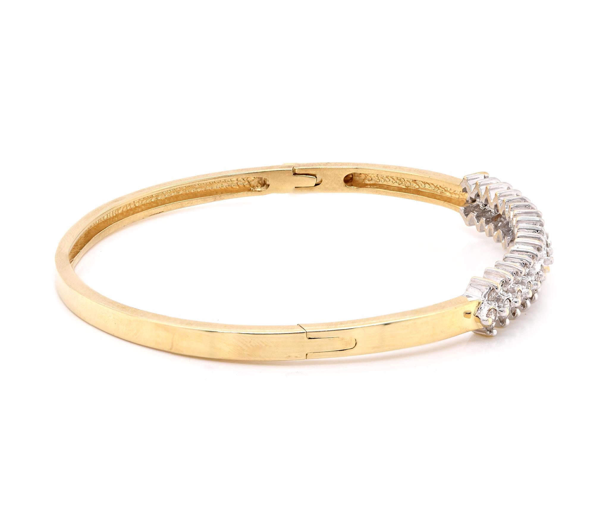 Designer: custom designed 
Material: 14k yellow gold
Diamonds: 49 round cut = .83cttw
Color: H
Clarity: SI2
Dimensions: bracelet will fit a 7-inch wrist 
Weight: 13.43 grams	