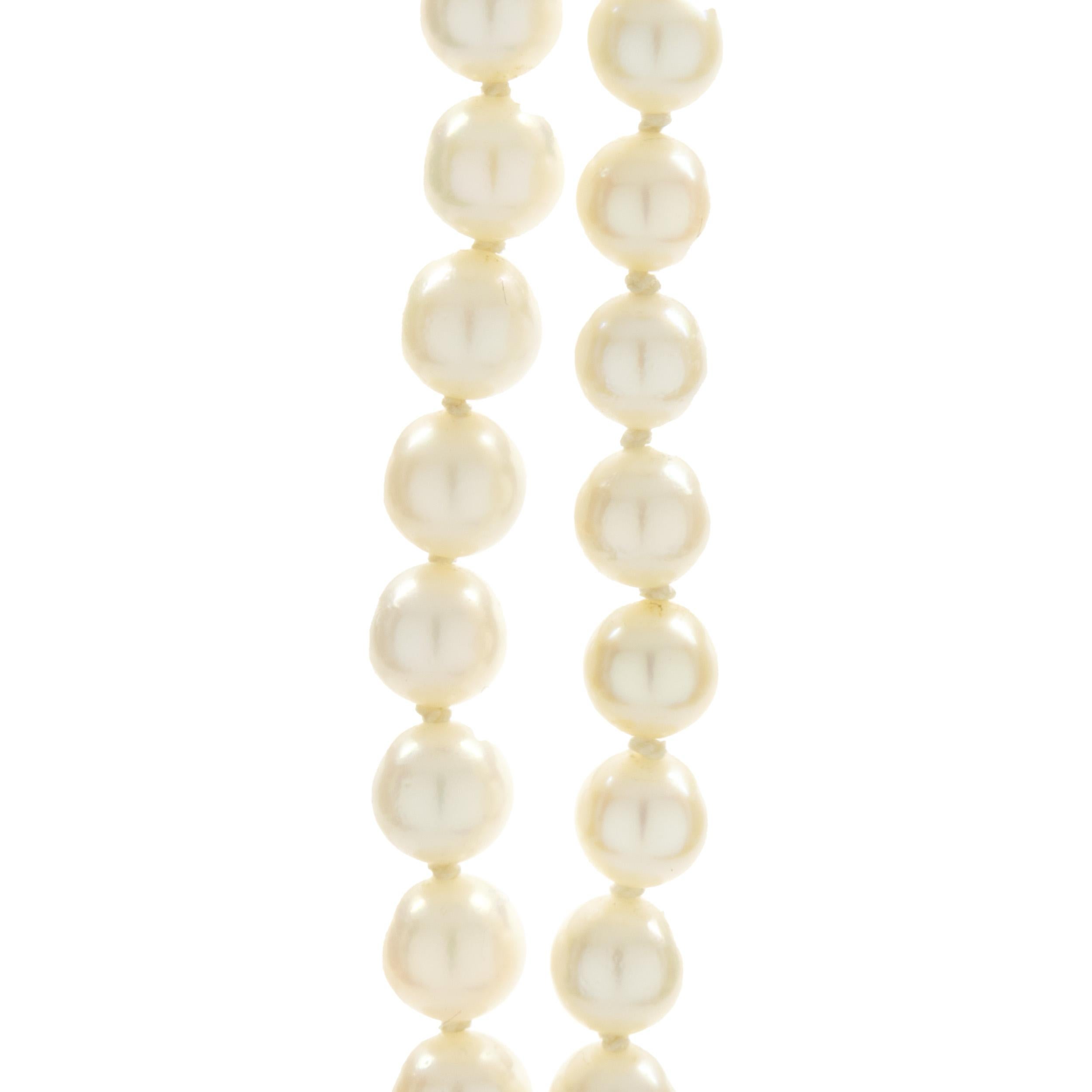 Round Cut 14 Karat Yellow Gold Vintage Double Row Pearl and Diamond Bracelet For Sale