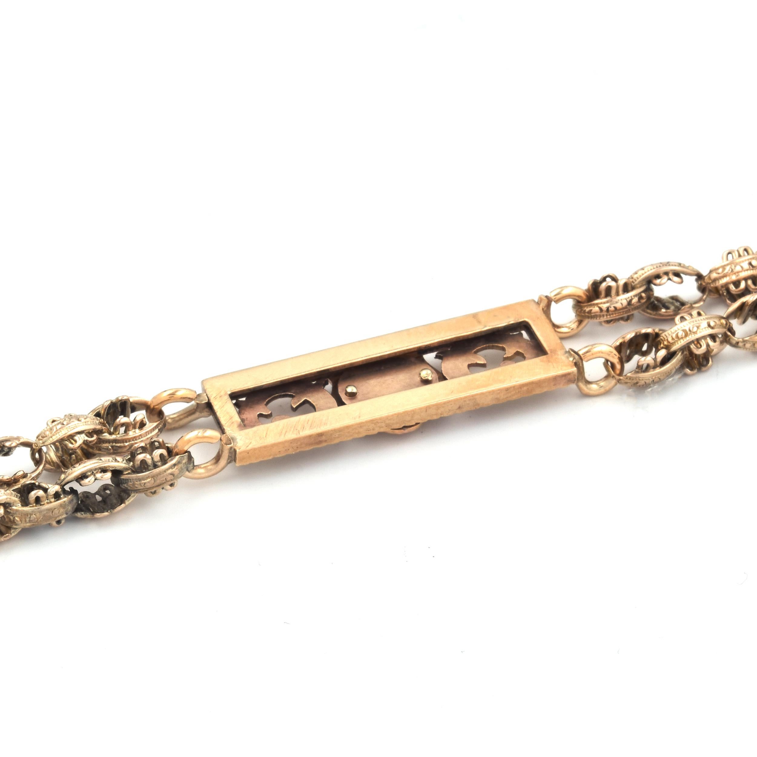 Designer: custom
Material: 14K yellow gold 
Dimensions: bracelet will fit up to a 6.5-inch wrist
Weight: 17.35 grams

