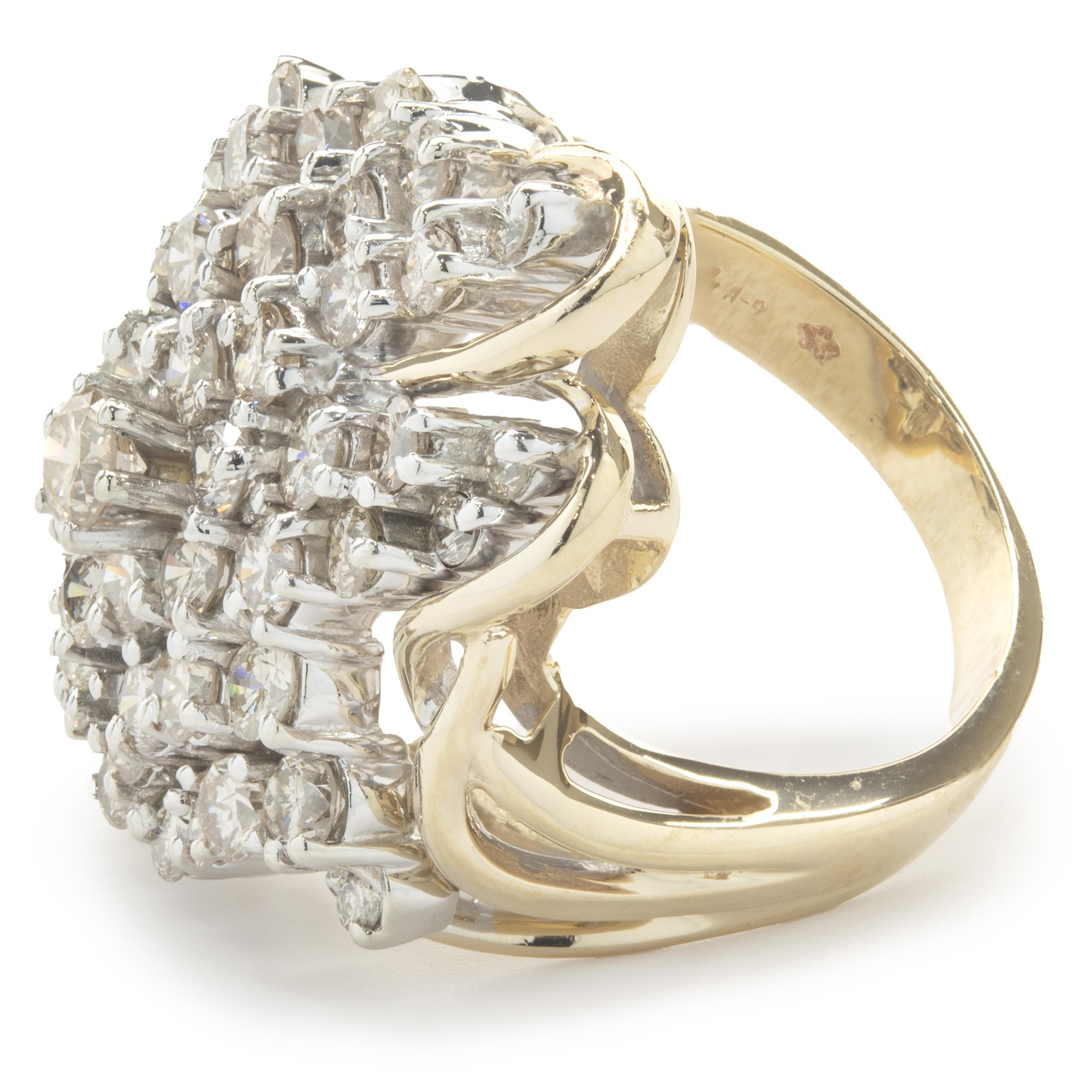 Designer: custom
Material: 14K yellow gold
Diamond:  round brilliant  cut = 3.15cttw
Color: K /L
Clarity: SI1
Ring size: 7 (please allow two additional shipping days for sizing requests)
Dimensions: Ring width measures 30.25mm 
Weight: 14.23 grams  