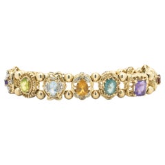 14 Karat Yellow Gold Vintage Multi Gemstone and Diamond Slide Bracelet