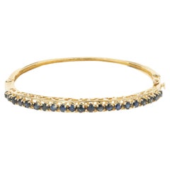 14 Karat Yellow Gold Vintage Sapphire Bangle Bracelet