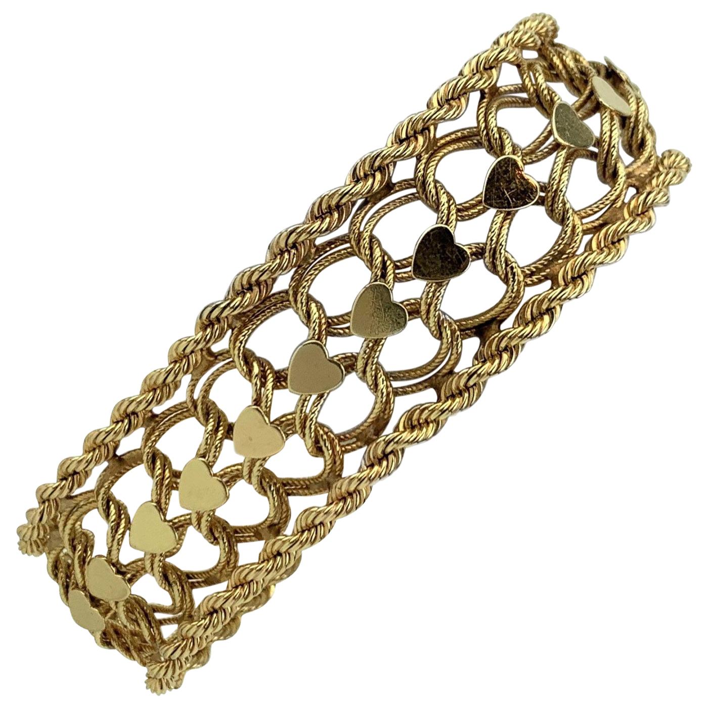 14 Karat Yellow Gold Vintage Spiral Rope Heart Charm Bracelet