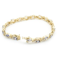 14 Karat Yellow Gold Vintage Tanzanite and Diamond Link Bracelet