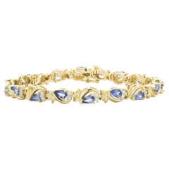 14 Karat Yellow Gold Vintage Tanzanite and Diamond Link Bracelet