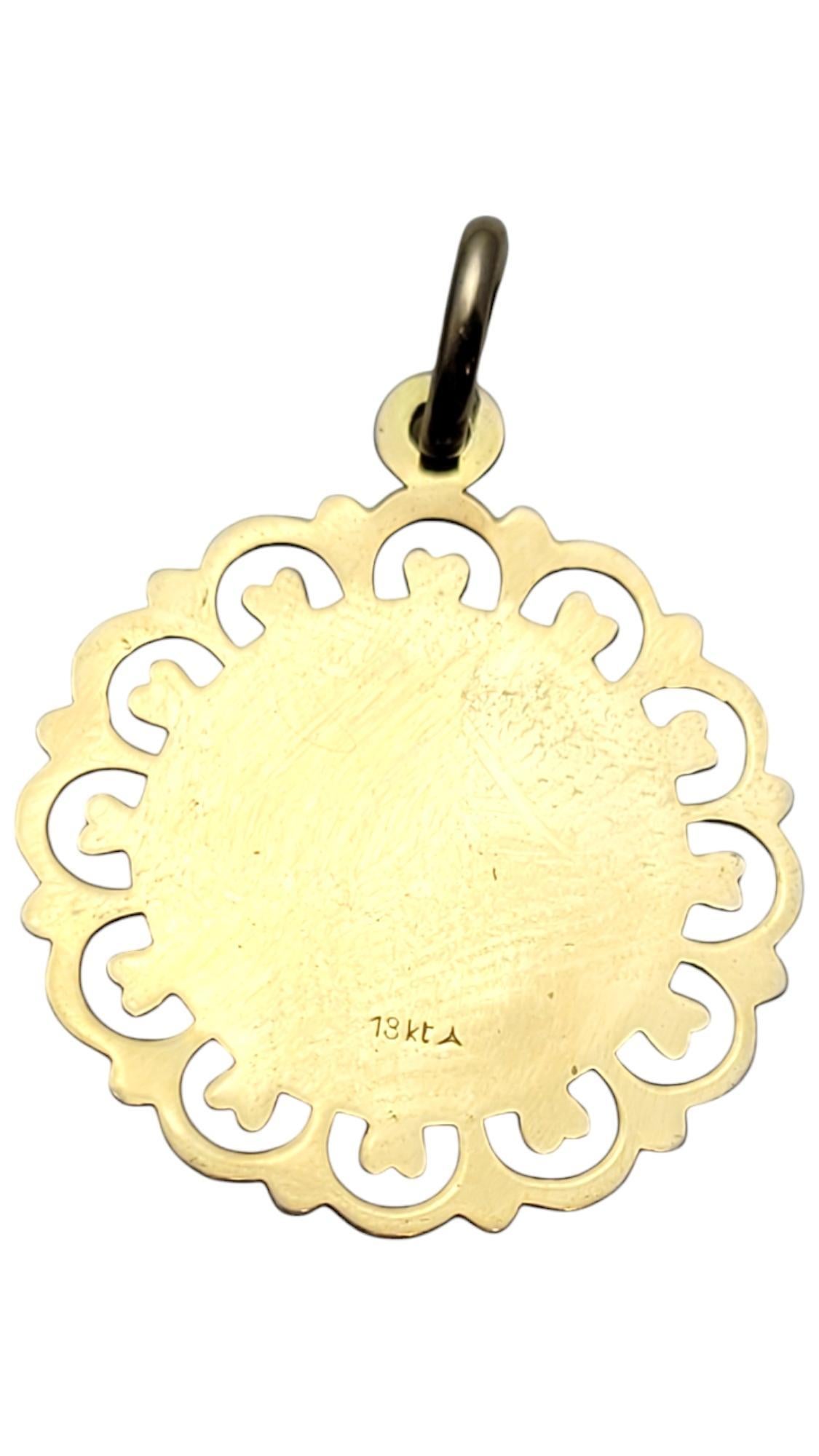 14K Yellow Gold Virgin Mary Scalloped Pendant

This 14K yellow gold Virgin Mary scalloped pendant showcases a beautifully detailed depiction of the Virgin Mary, framed by an elegant scalloped border. Crafted with precision, it features a radiant