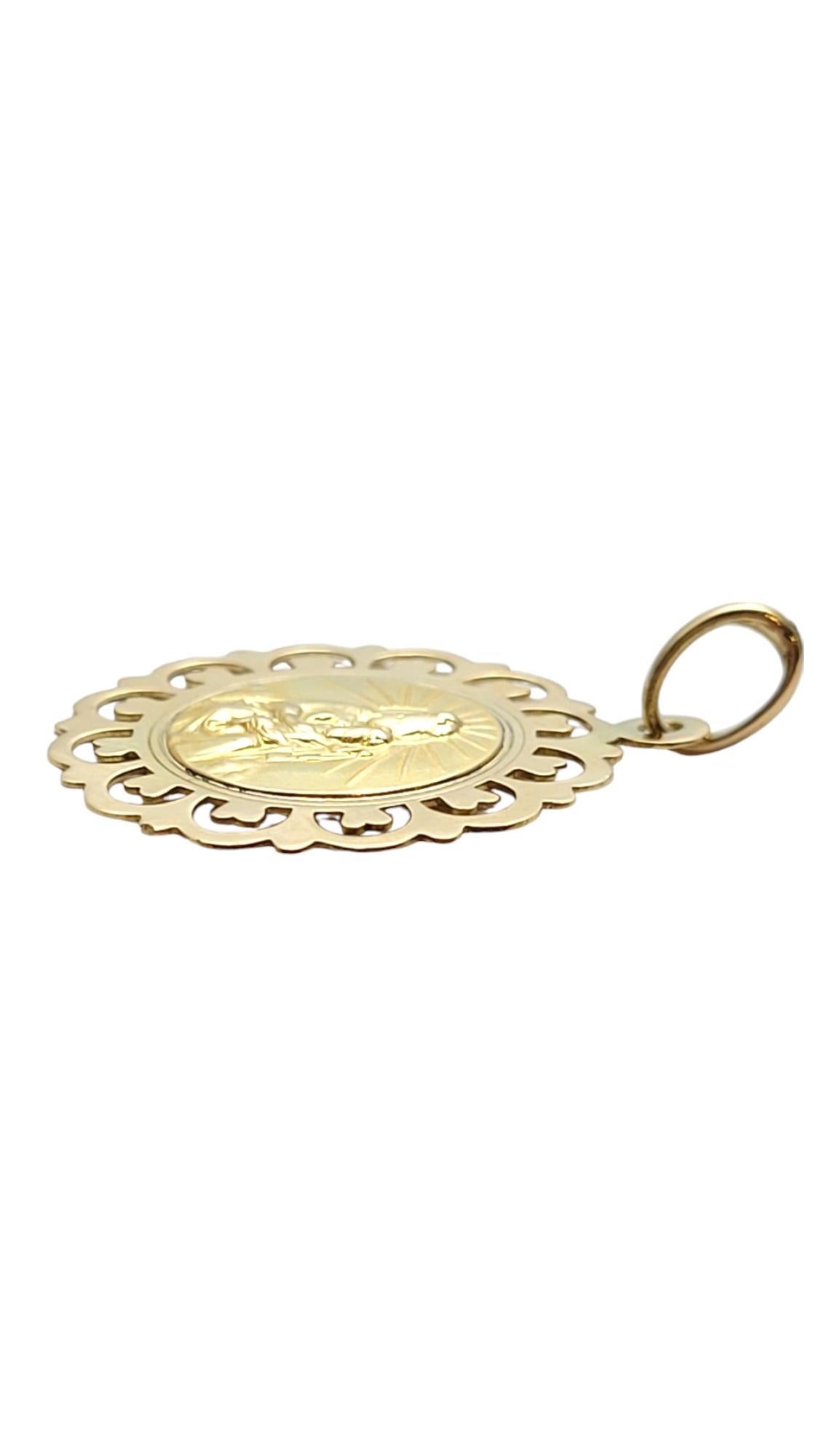 14 Karat Yellow Gold Virgin Mary Scalloped Pendant #20911 For Sale 1