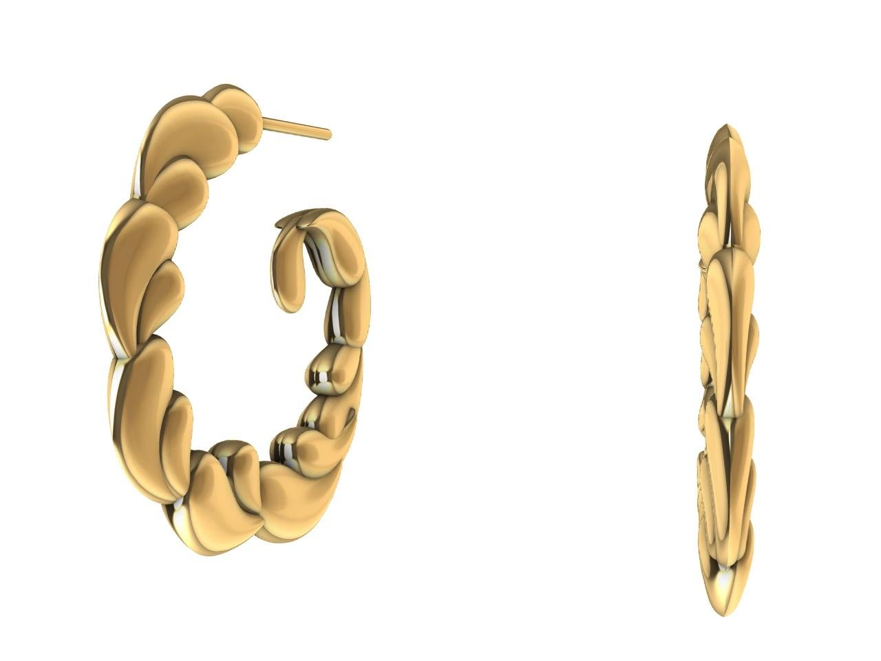 boucles d'oreilles en or jaune 14 carats, Thomas Kurilla, designer de Tiffany, accueille la nouvelle collection Light, Water, Mind. Obtention de deux hernies discales en 2018, et découverte de la cyrothérapie en 2020. La blessure est devenue une