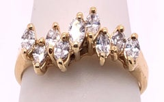 14 Karat Gelbgold Hochzeitsring mit Marquise-Diamanten