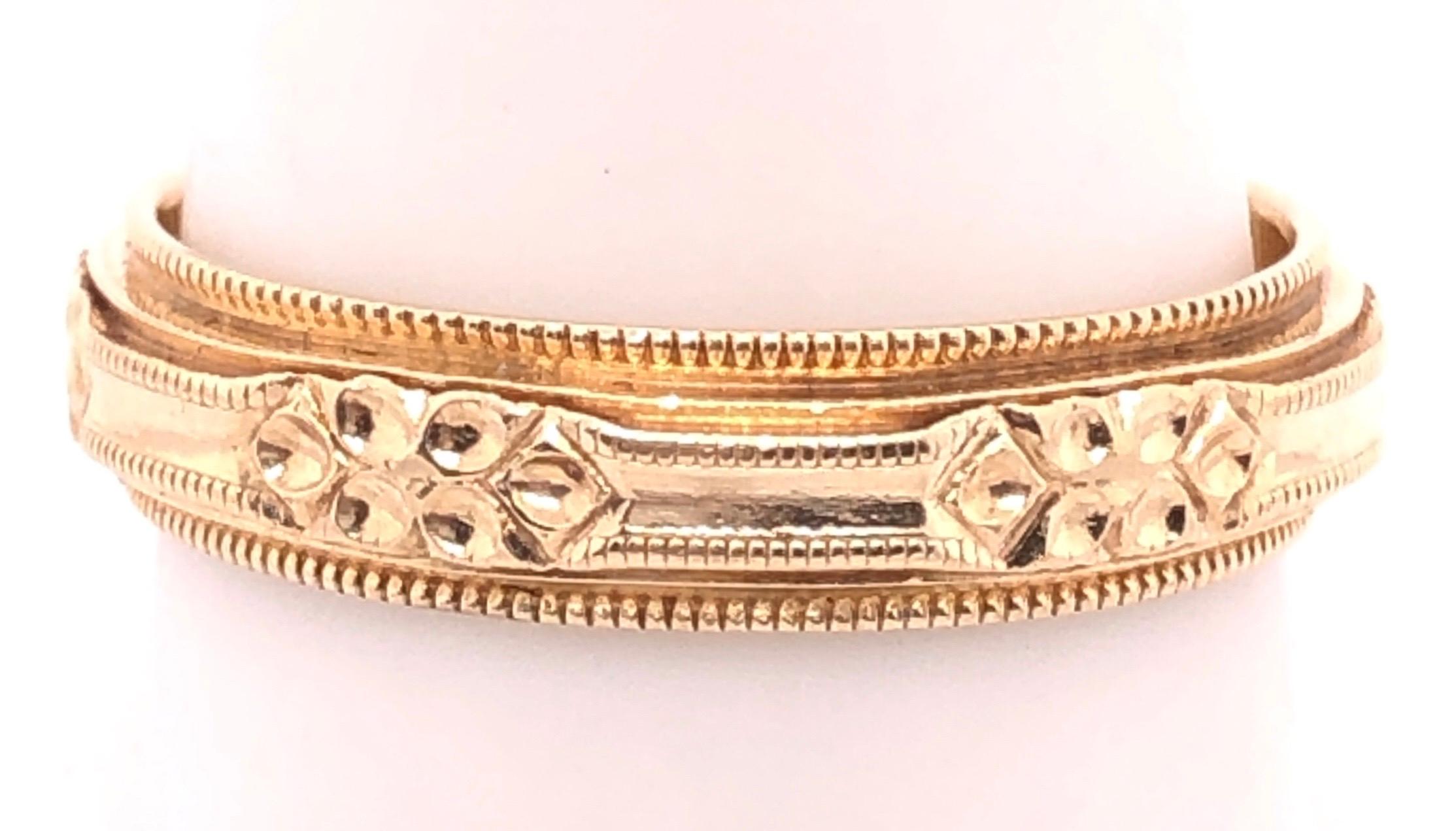 Moderne Anneau de mariage en or jaune 14 carats / anneau à design continu en vente