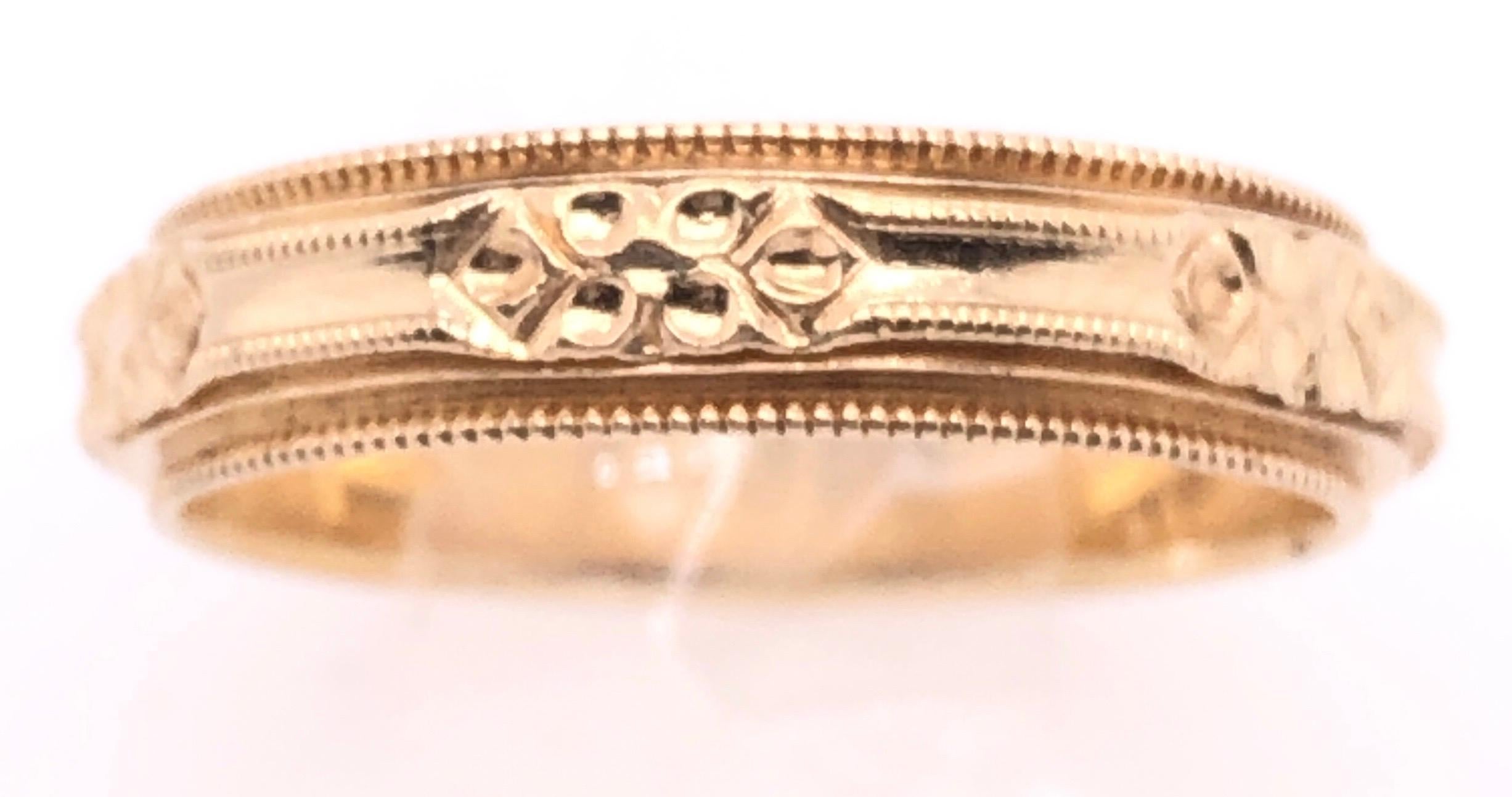 Anneau de mariage en or jaune 14 carats / anneau à design continu Unisexe en vente