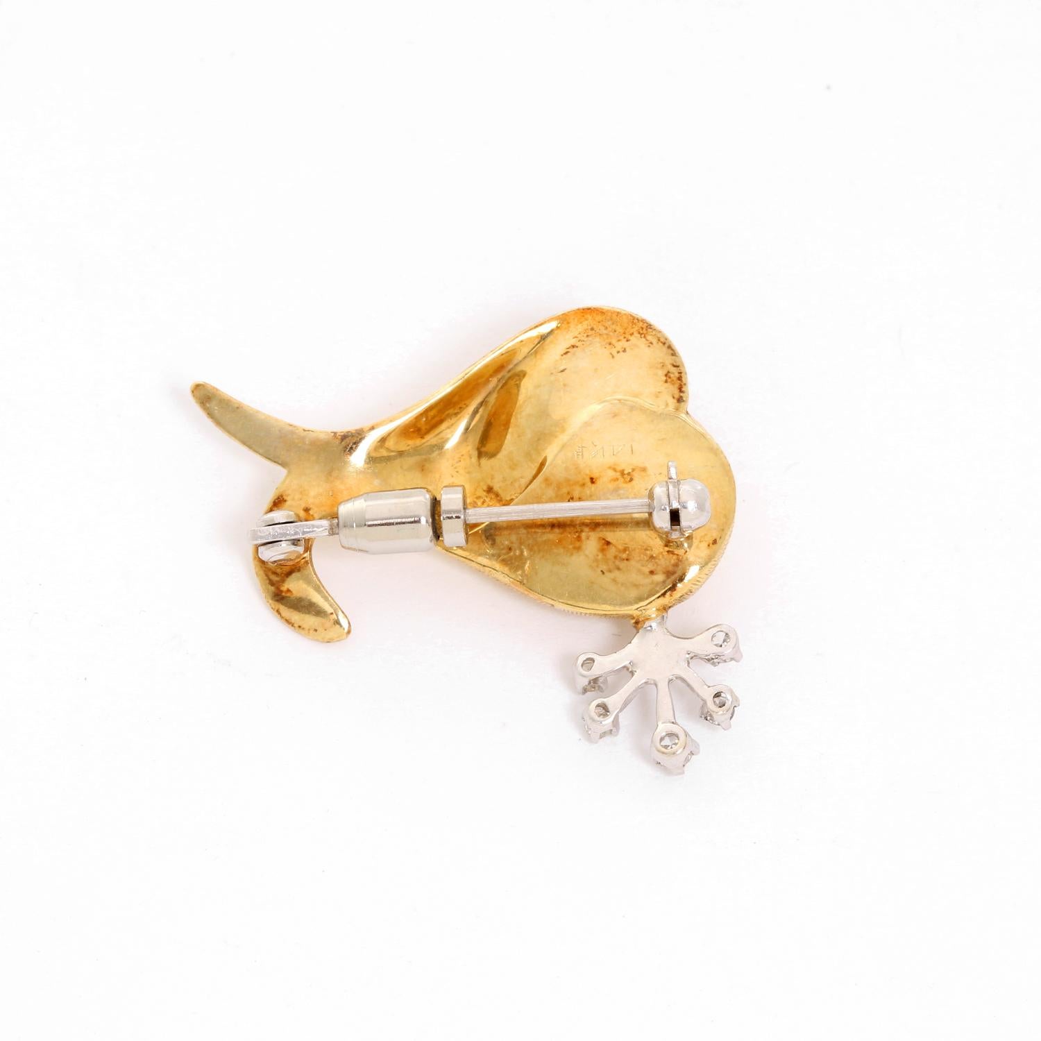 14K Yellow Gold Whale Brooch  - Single cut diamonds set on 14K yellow gold with a ruby on the whale. Diamond approx weight .10 cts. Total grams 5.57. Total length 27 mm x 22 mm .