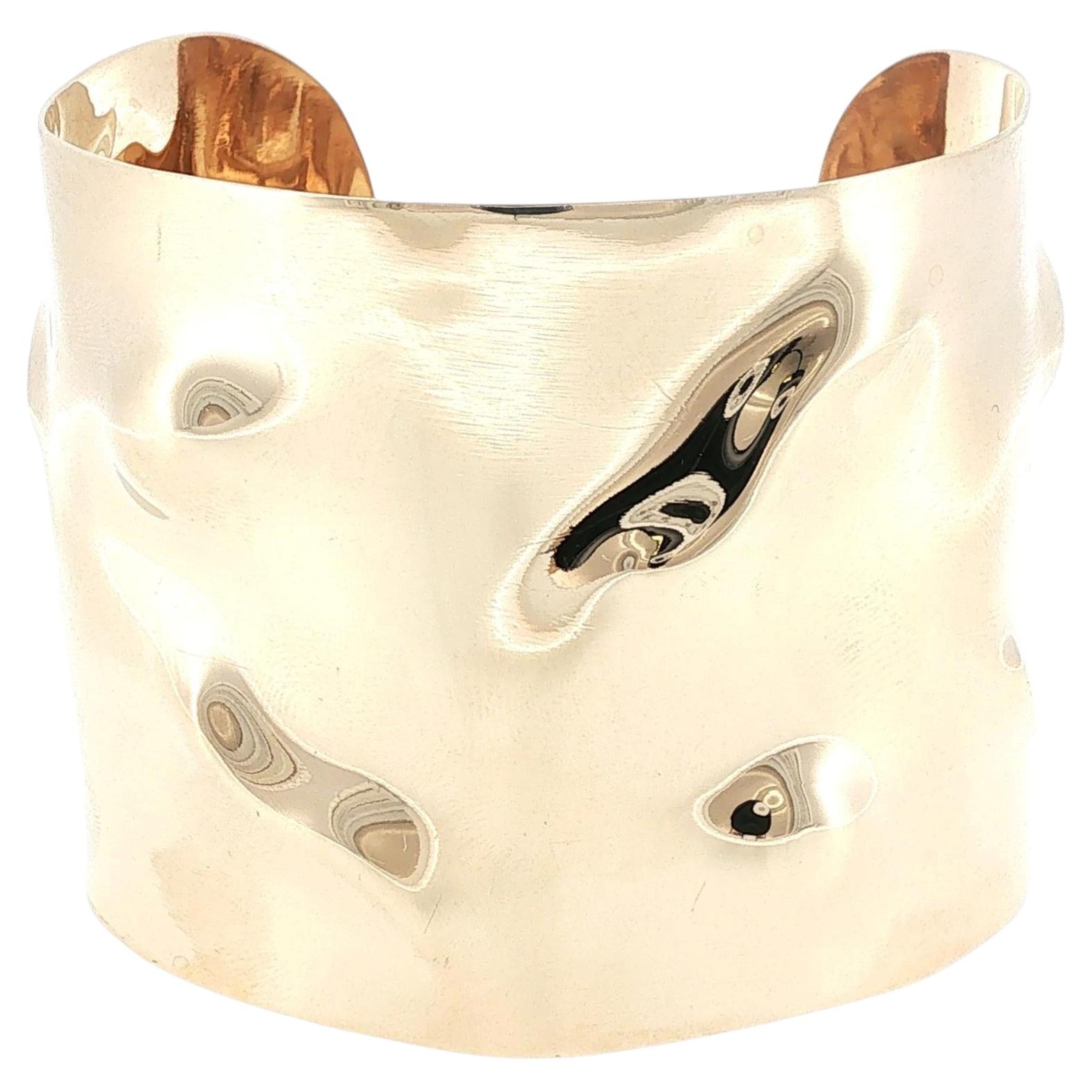 Bracciale largo in oro giallo 14 carati
