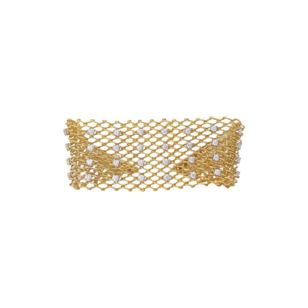 14 Karat Yellow Gold wide bracelet featuring a mesh design with 40 round brilliants weighing 1.49 carats.
Color G-H
Clarity SI1-SI2
