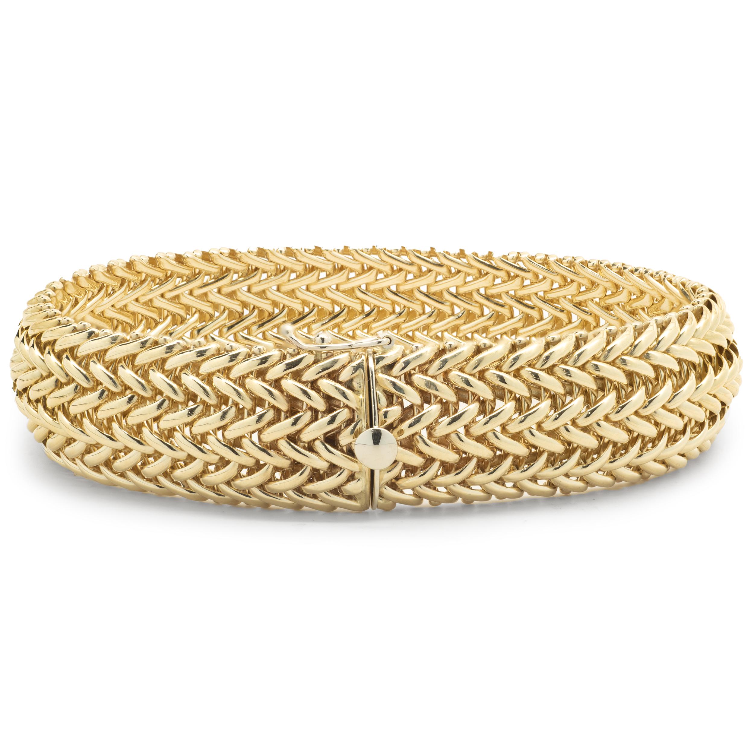 Designer: custom 
Material: 14K yellow gold
Dimensions: bracelet measures 7.5-inches in length 
Weight: 23.85 grams
