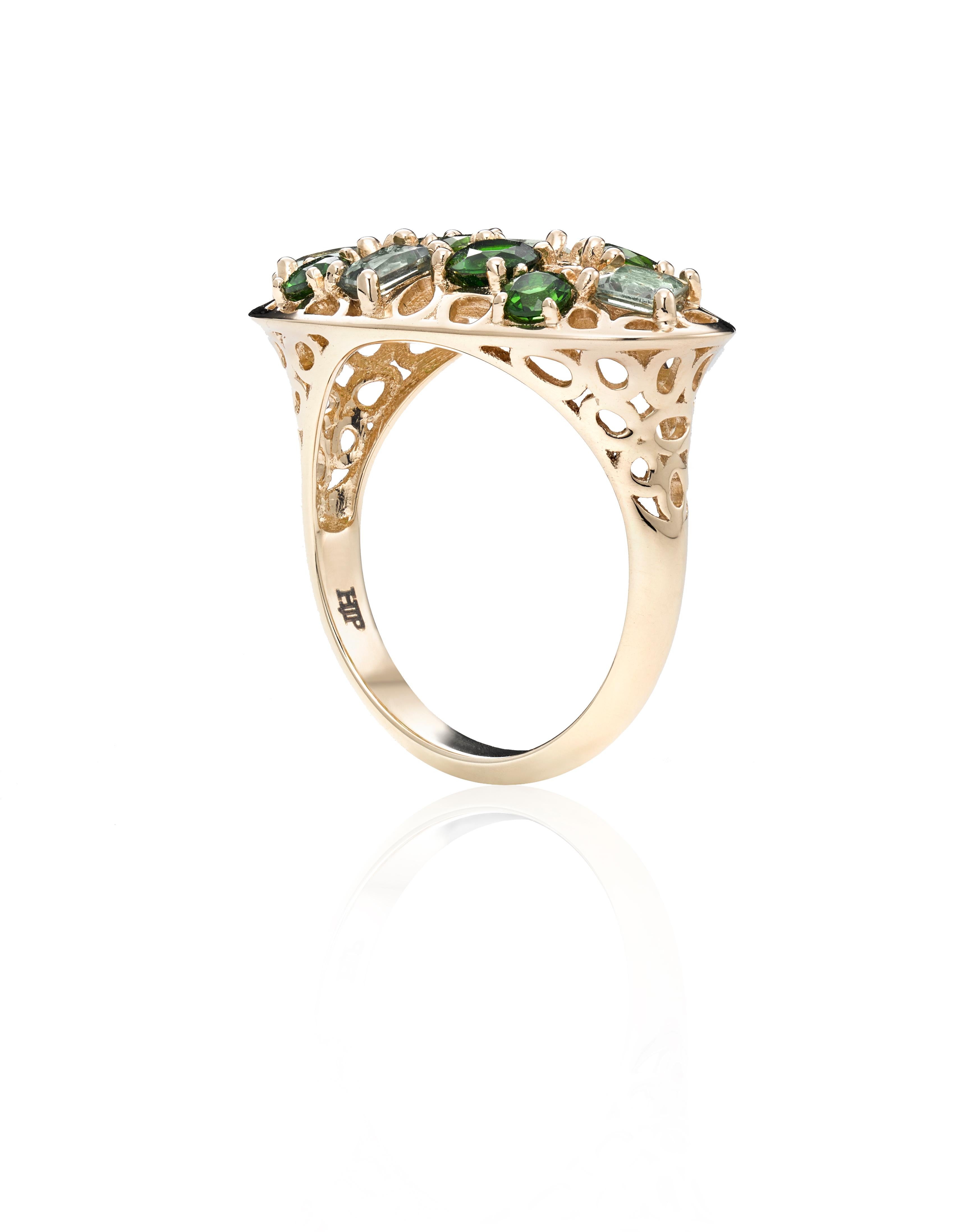 Prong set Green Sapphires and Chrome Diopside stones scattered within Hi June Parker's signature intricate open work of organic circular motifs are captured in this Statement ring created to be worn with a cocktail dress, strong suit or your