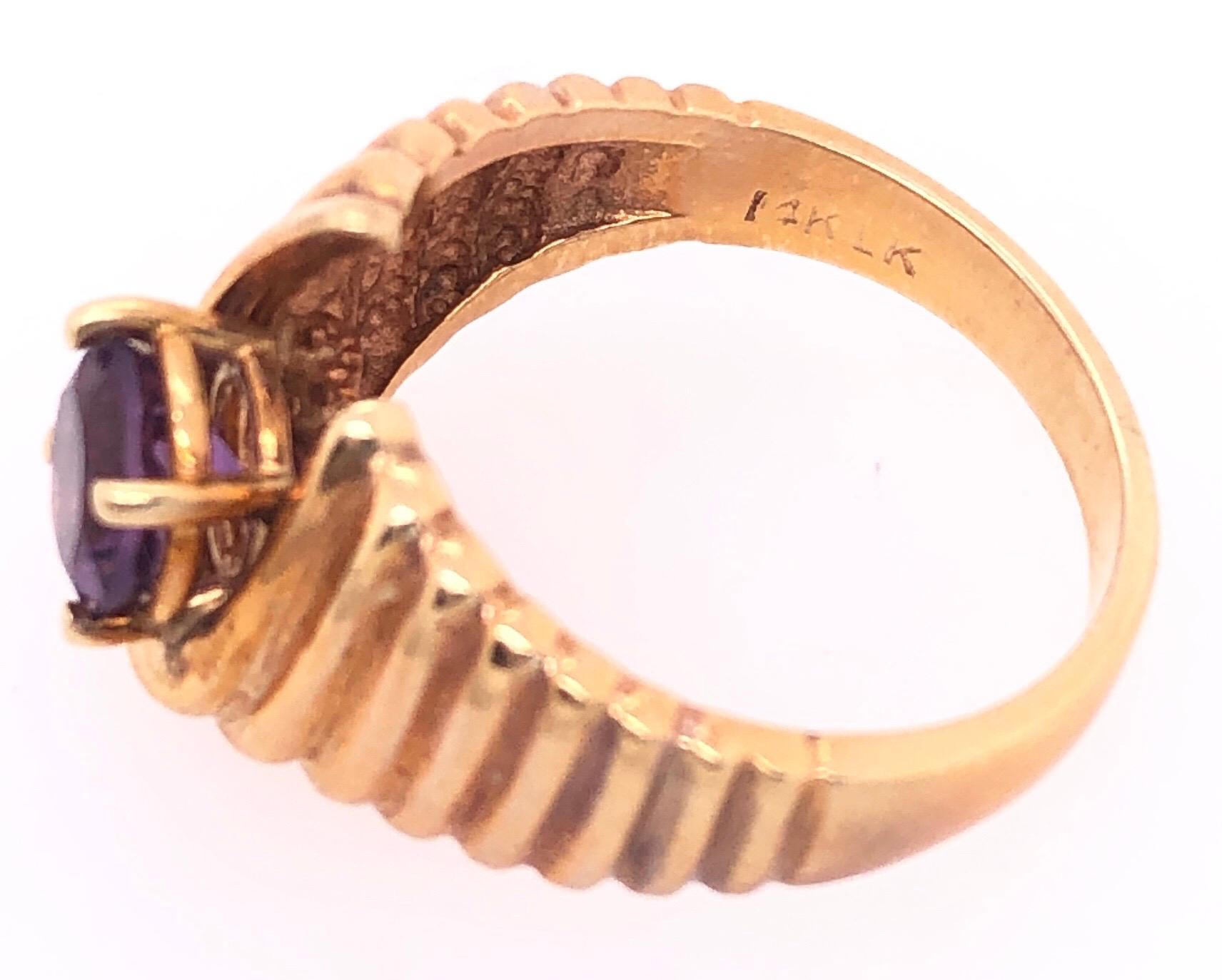 14 Karat Yellow Gold with Center Amethyst Dome Fashion Ring In Good Condition For Sale In Stamford, CT