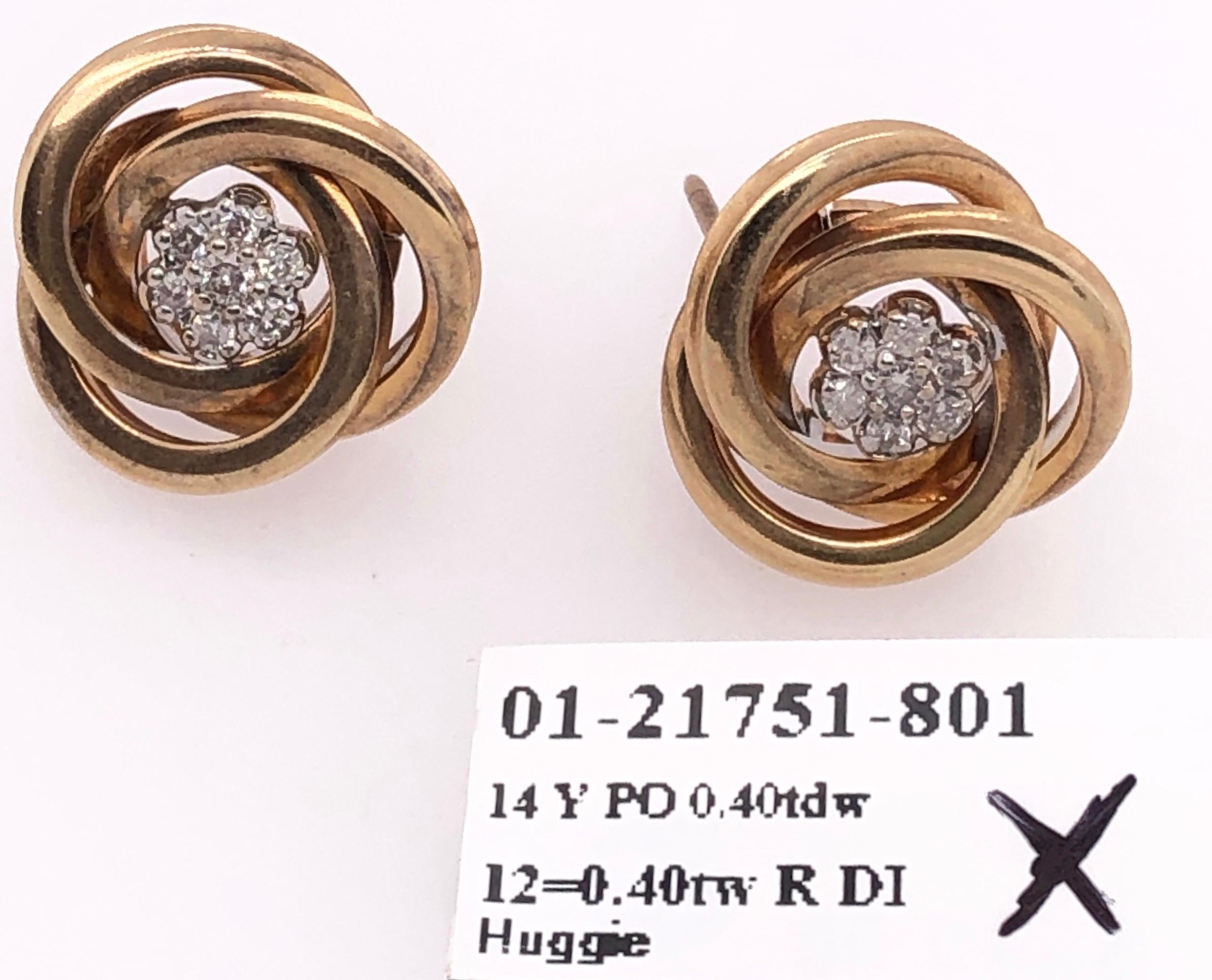 Modern 14 Karat Yellow Gold with Diamond Cluster Huggie Earrings For Sale