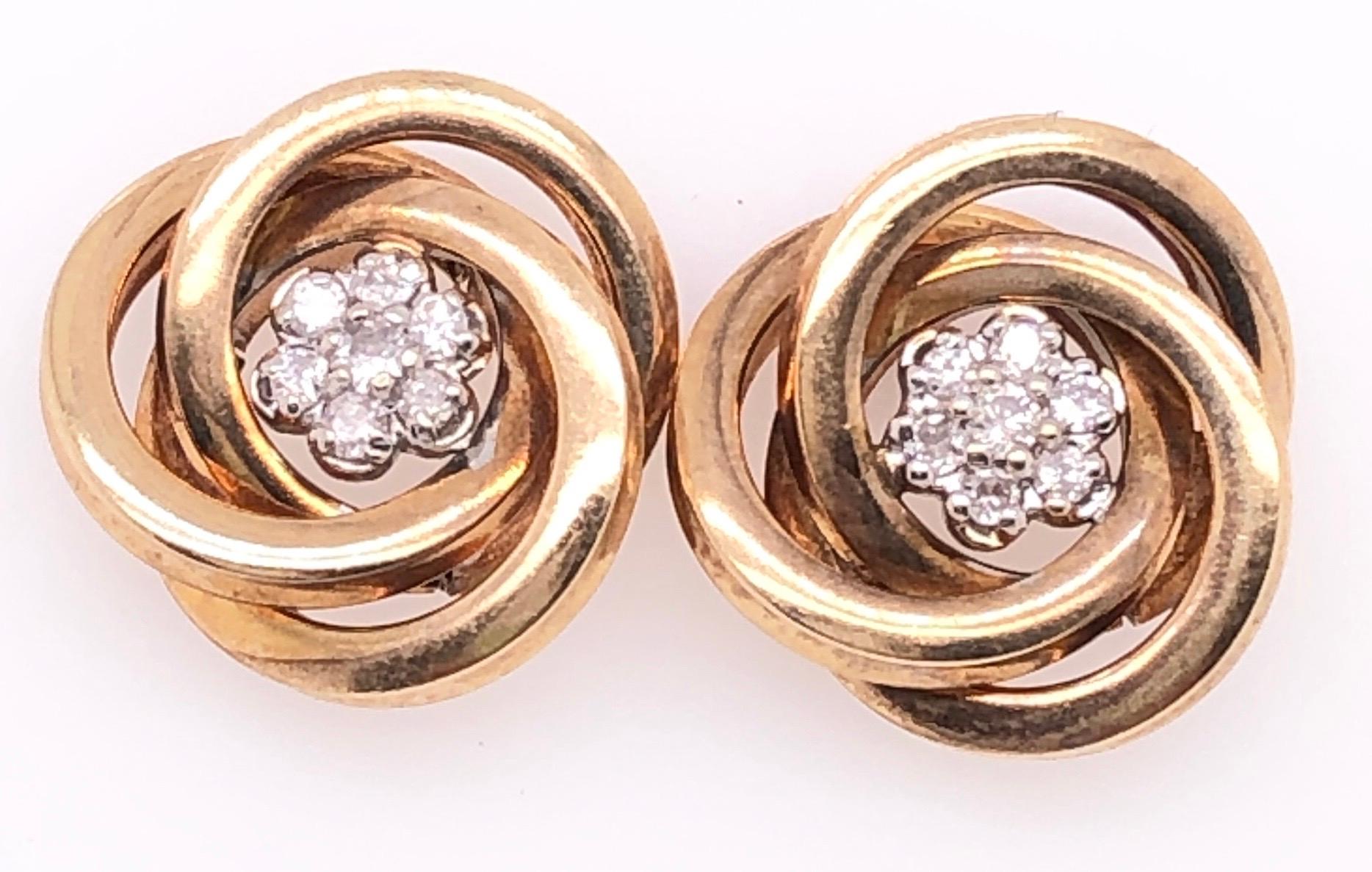 14 Karat Yellow Gold with Diamond Cluster Huggie Earrings In Good Condition For Sale In Stamford, CT