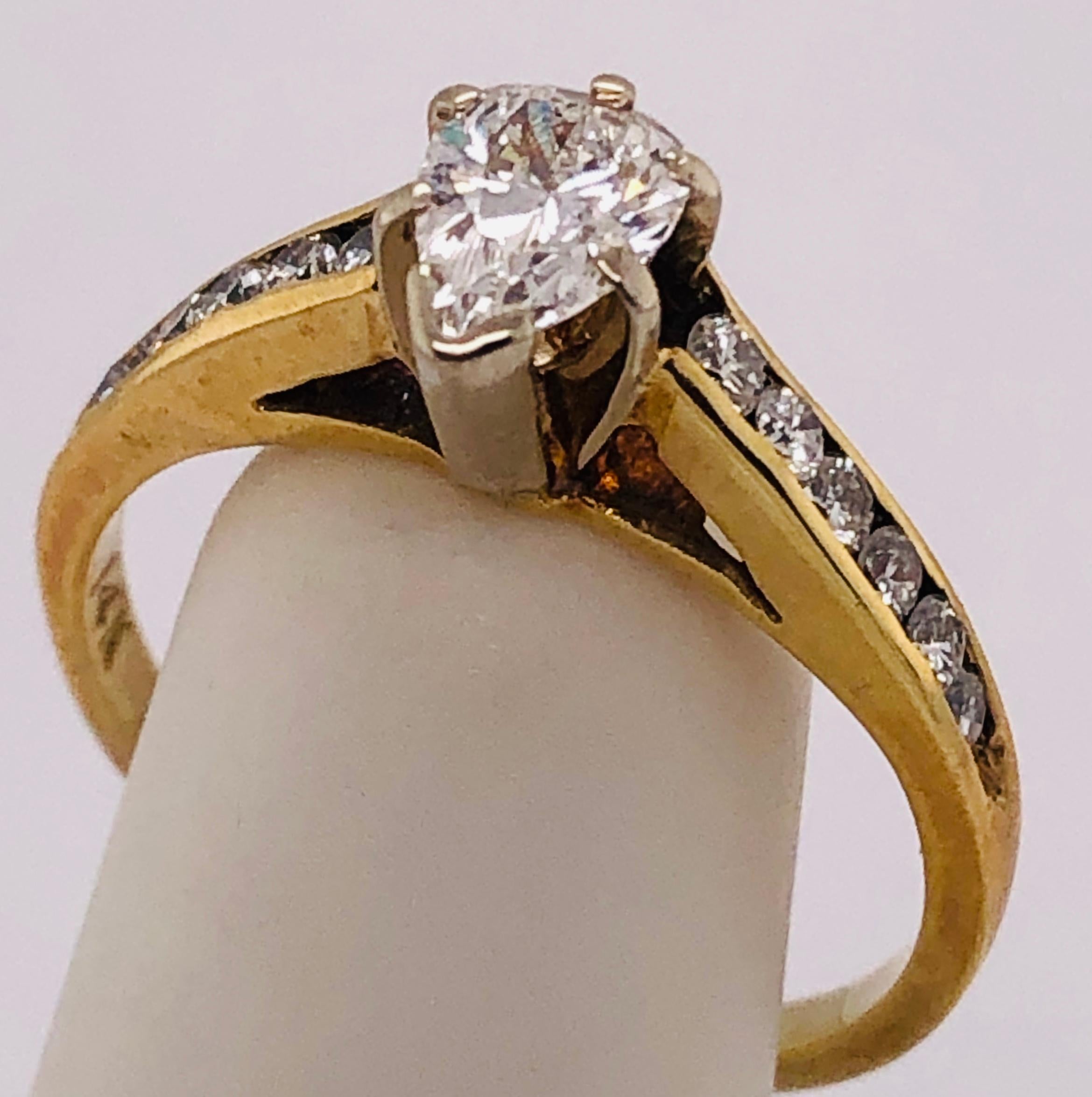 14Kt Yellow Gold With White Gold Prongs Engagement Bridal Ring 0.54 Total Diamond Weight.
Size 5.5