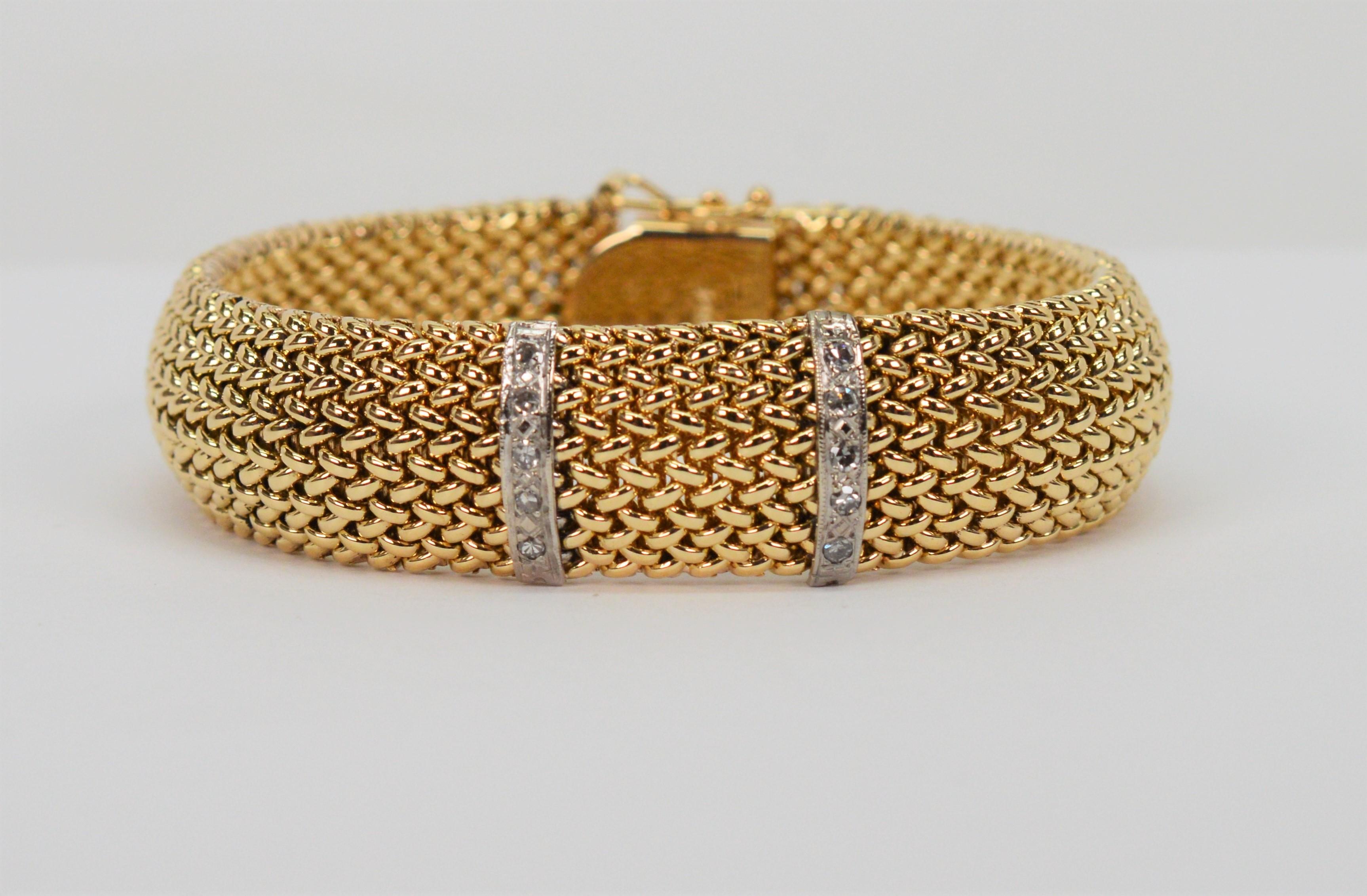 Pleasingly sleek with a touch of sparkle, this fine quality retro style bracelet is certainly on-trend today. Crafted of bright 14 karat yellow gold rounded mesh  with a smooth finish that is attractively contoured and measure one-half inch wide.