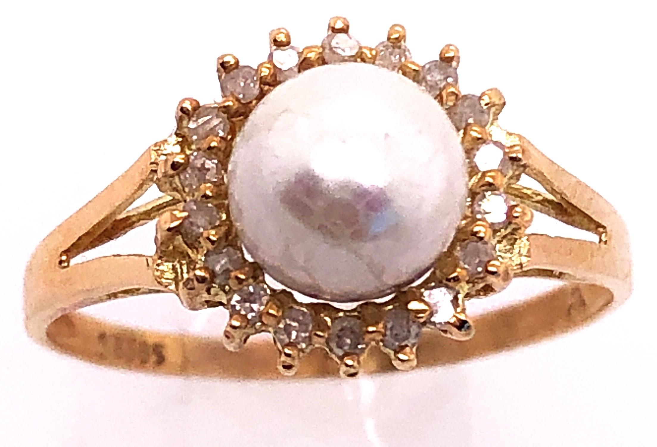14 Karat Yellow Gold Fashion Pearl Ring with Diamonds Size 8.5
6 mm diameter pearl
2.4 grams total weight.