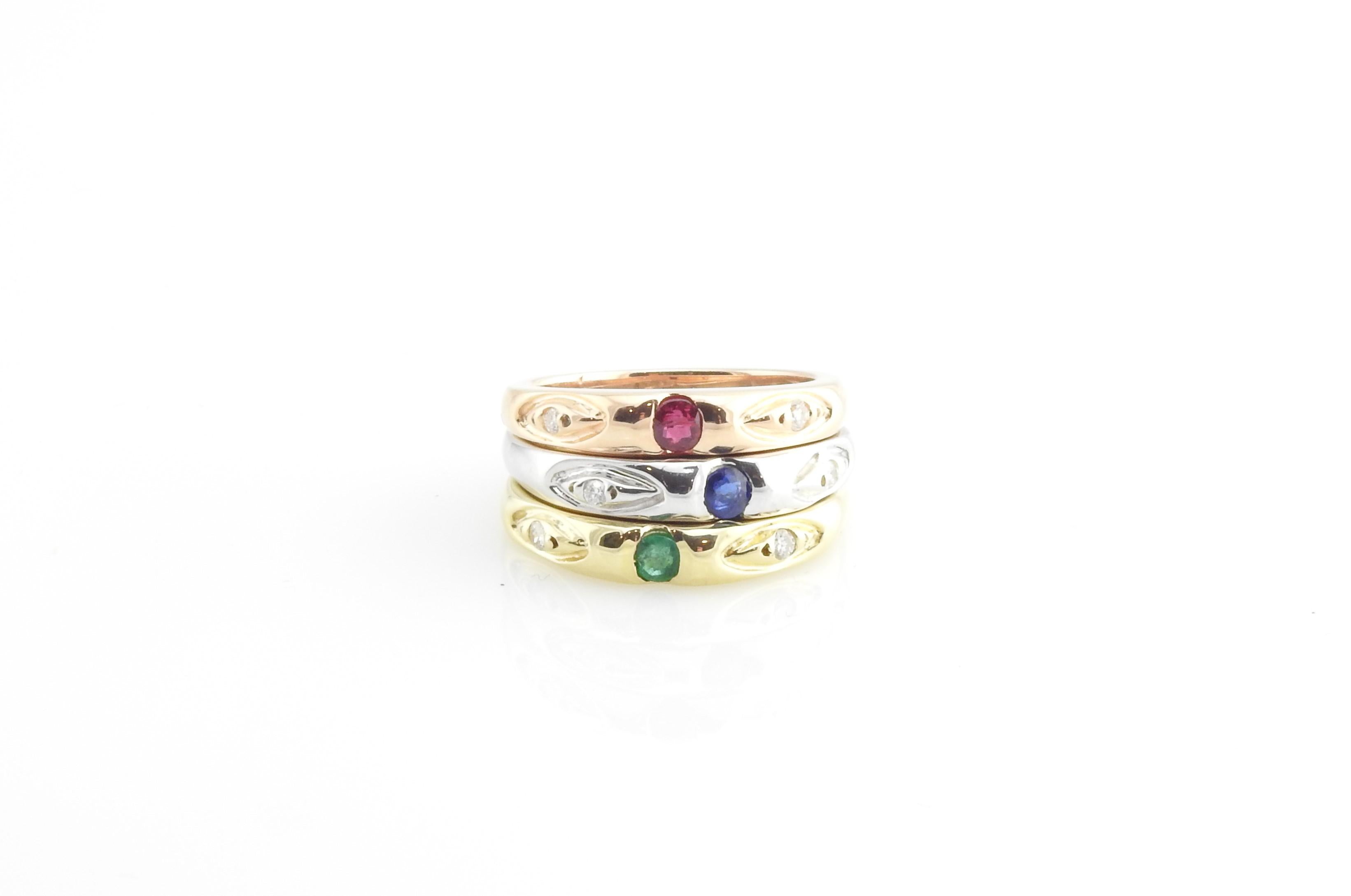 Vintage 14 Karat White, Rose and Yellow Gold Stacking Rings Size 7

This set of three stacking rings includes one white, one yellow and one rose gold band detailed with one sapphire, one emerald and one ruby respectively. Each is decorated with two