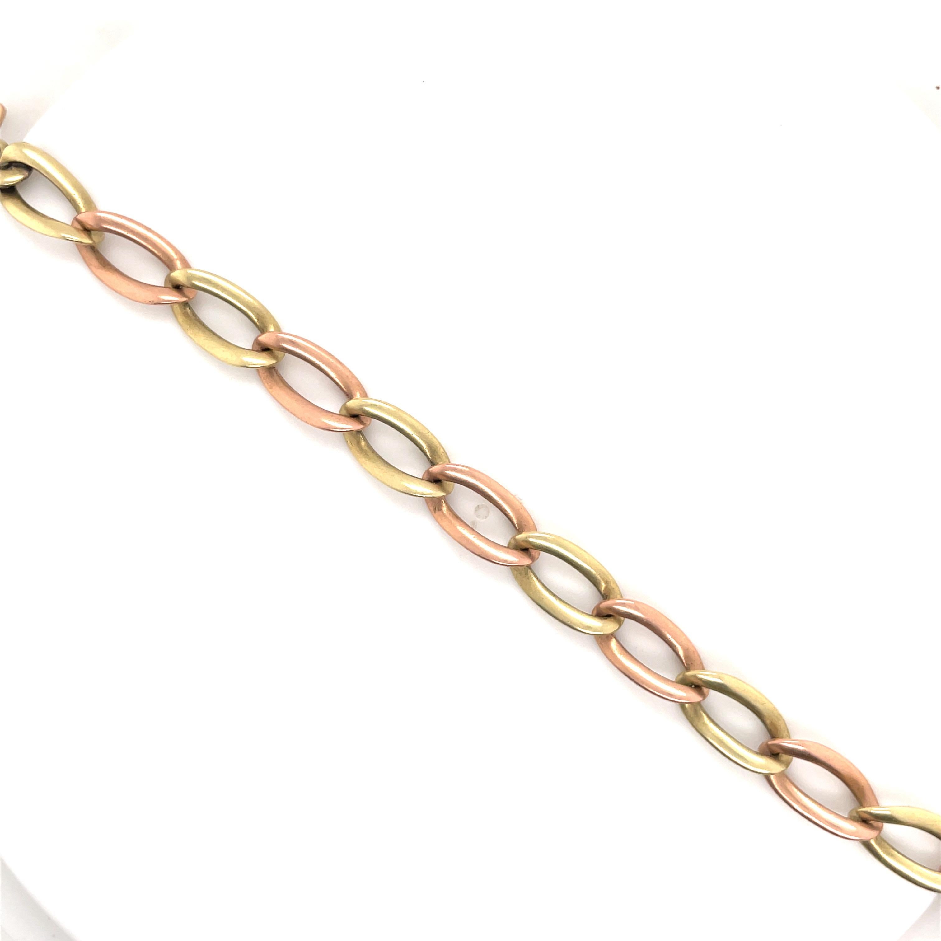 Contemporary 14 Karat Yellow & Rose Gold Twisted Curb Link Bracelet 19.2 Grams For Sale
