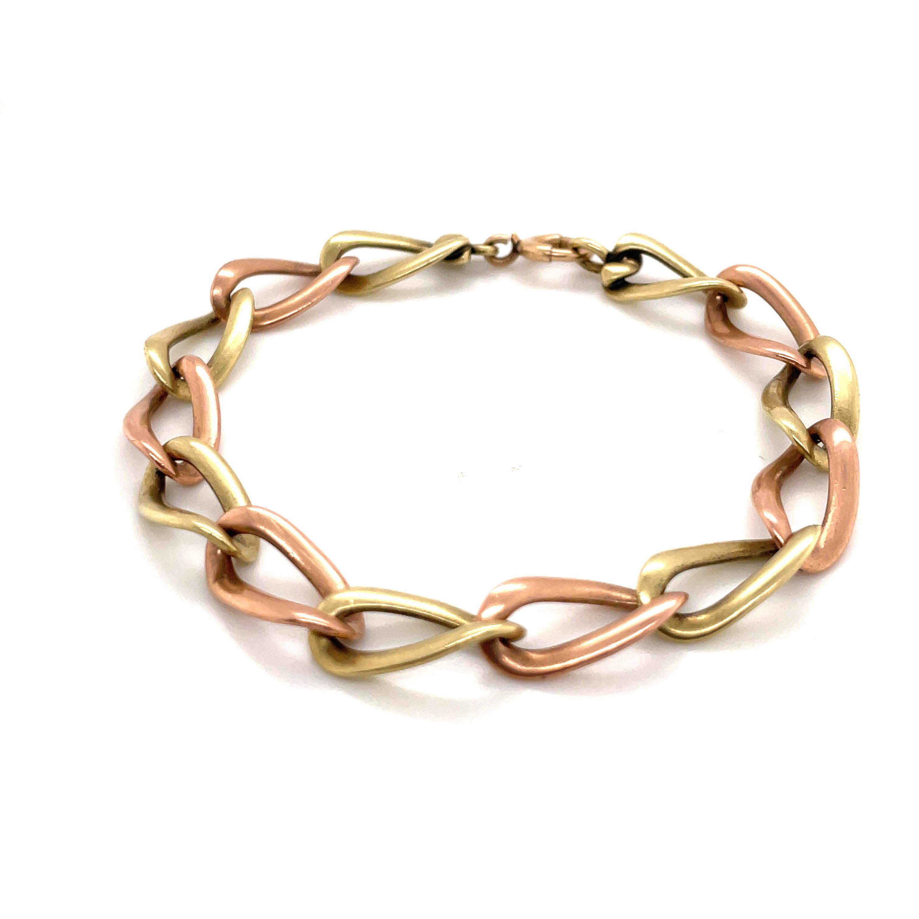 14 Karat Yellow & Rose Gold Twisted Curb Link Bracelet 19.2 Grams In Excellent Condition For Sale In New York, NY