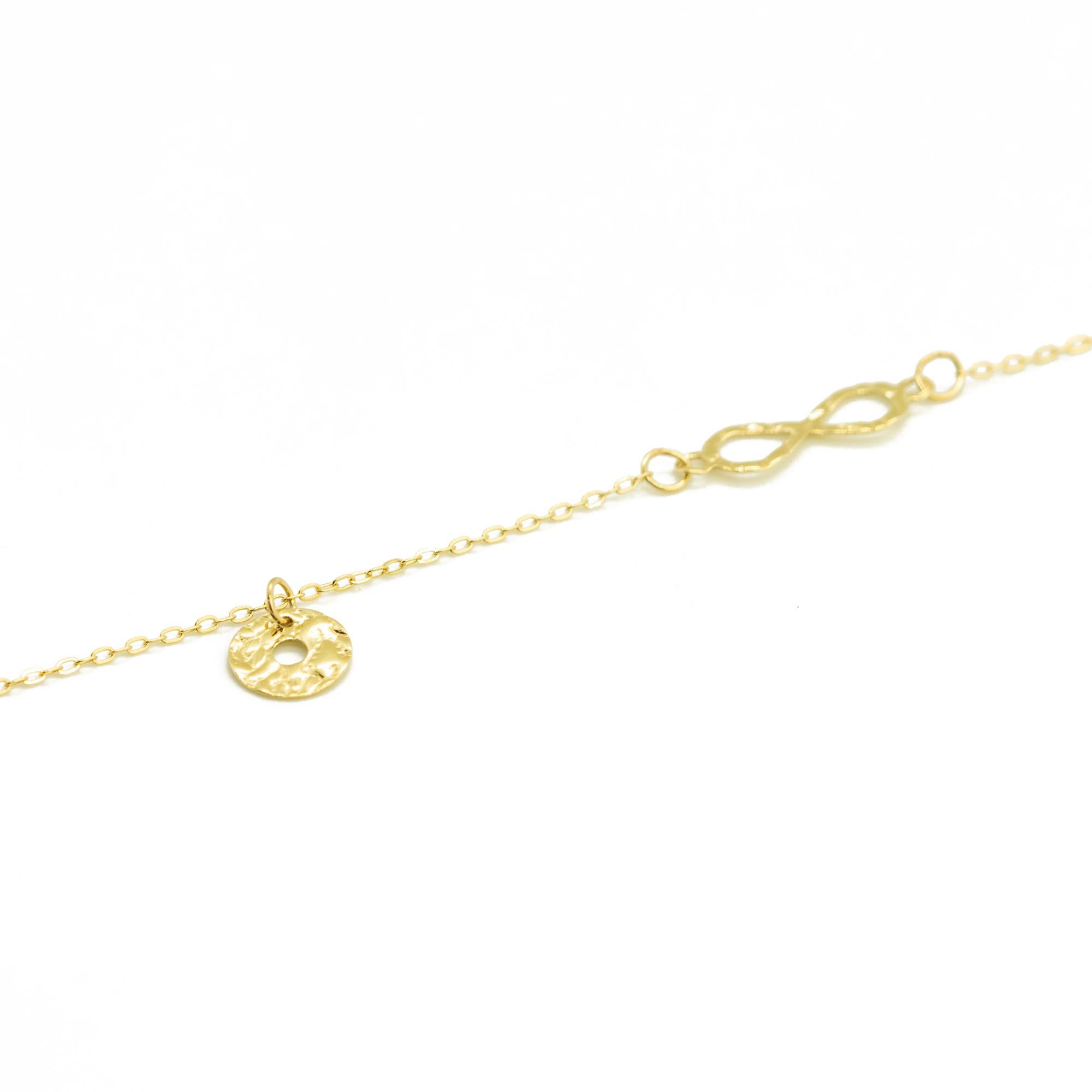 Bracciale a catena con ciondolo del segno fortunato dell'infinito in oro giallo massiccio 14 carati in vendita 3