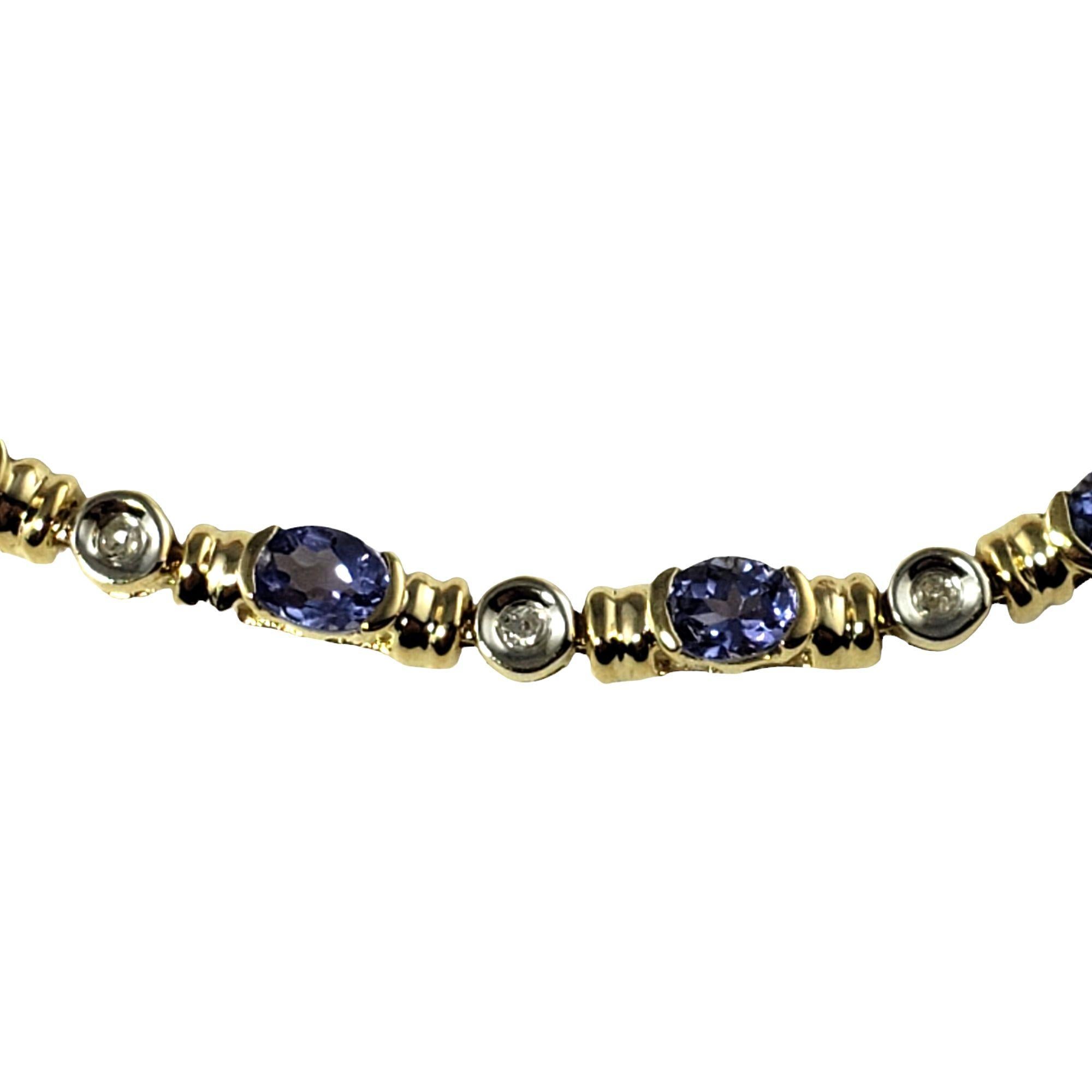 Oval Cut 14 Karat Yellow Tanzanite and Diamond Bracelet #13712 For Sale