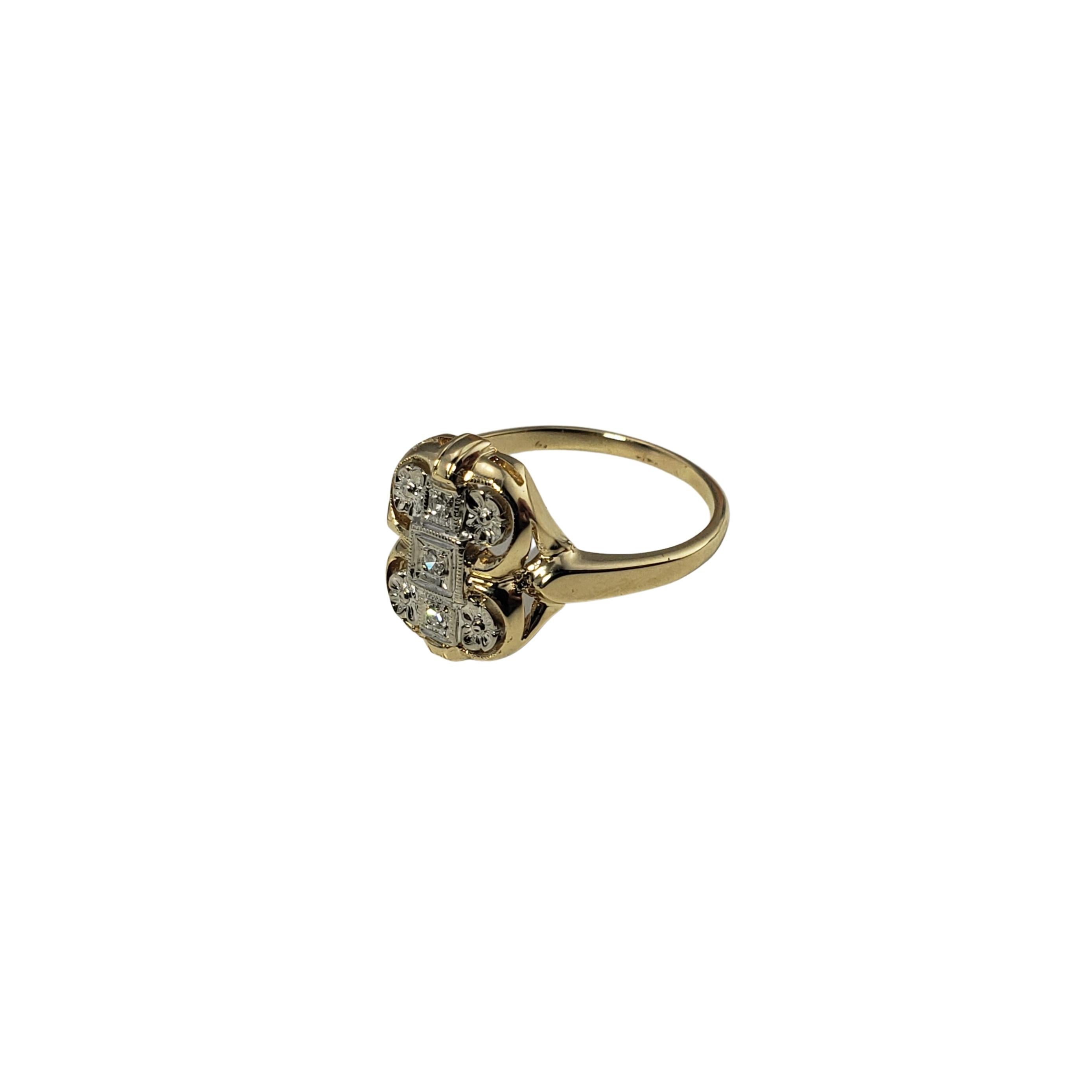 Vintage 14 Karat Yellow/White Gold and Diamond Ring Size 8.75-

This lovely ring features three round single cut diamonds set in beautifully detailed 14K yellow and white gold. Width: 15 mm.
Shank: 2 mm.

Approximate total diamond weight: .06