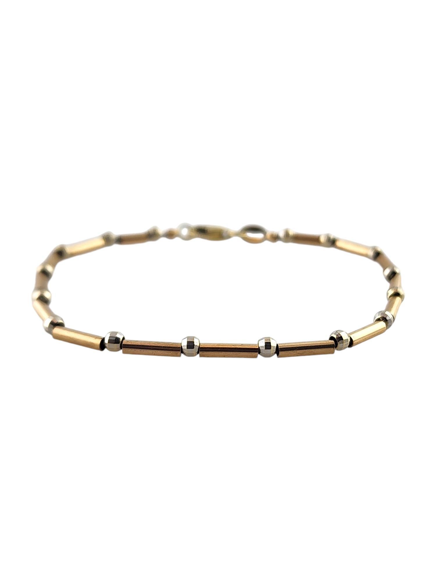 14 Karat Yellow & White Gold Bead and Bar Bracelet

This gorgeous bracelet was meticulously crafted from 14K yellow gold with some beautiful white gold detailing!

Size: 7.25