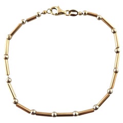 14 Karat Yellow & White Gold Bead and Bar Bracelet #18522