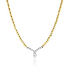 Collier en or jaune et blanc 14 carats serti de diamants taille poire