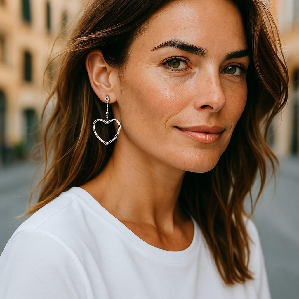 Introducing our exquisitely handcrafted 14 Karat Yellow and White Gold Diamond Open Delicate Heart Earrings—a stunning fusion of elegance, romance, and fine craftsmanship. These luxurious earrings feature a beautiful open heart design, suspended