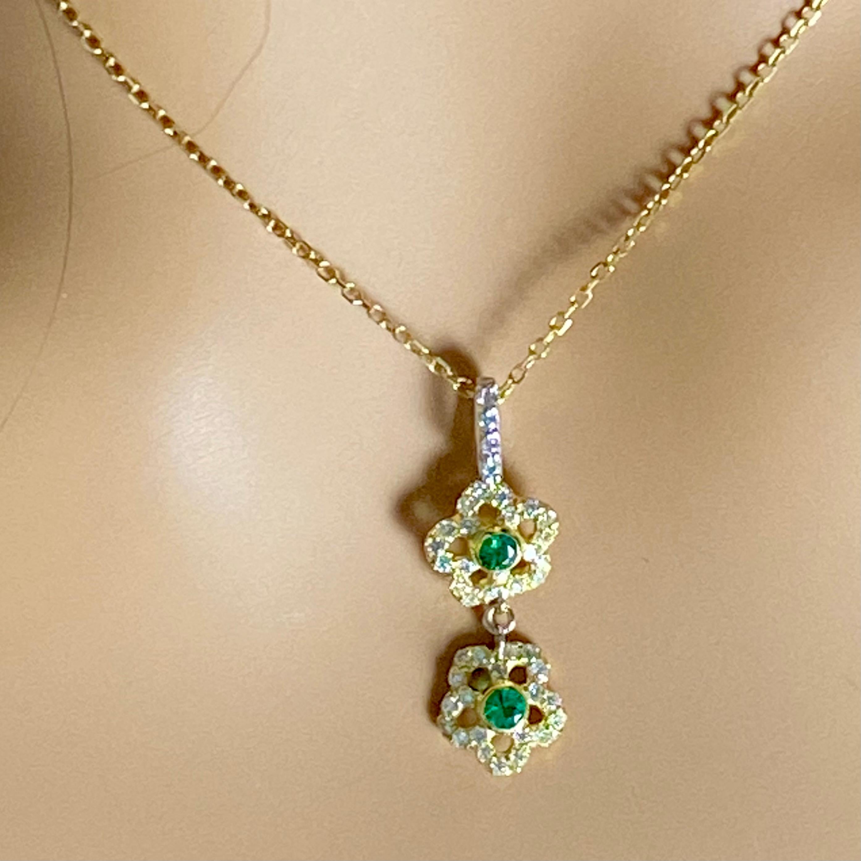 14 Karat Yellow White Gold Floral Pendant Necklace with Emeralds and Diamonds In New Condition For Sale In New York, NY